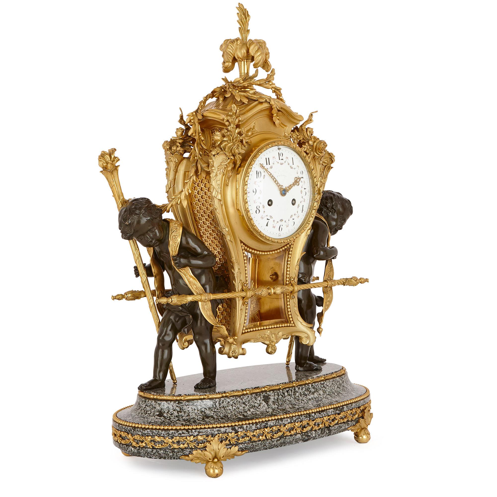 This three-piece set—composed of a clock and a pair of flanking candelabra—is a truly unique and delightful piece of decorative art. 

The clock is modelled in the image of an 18th century sedan chair – that is, a covered chair sat in by a member