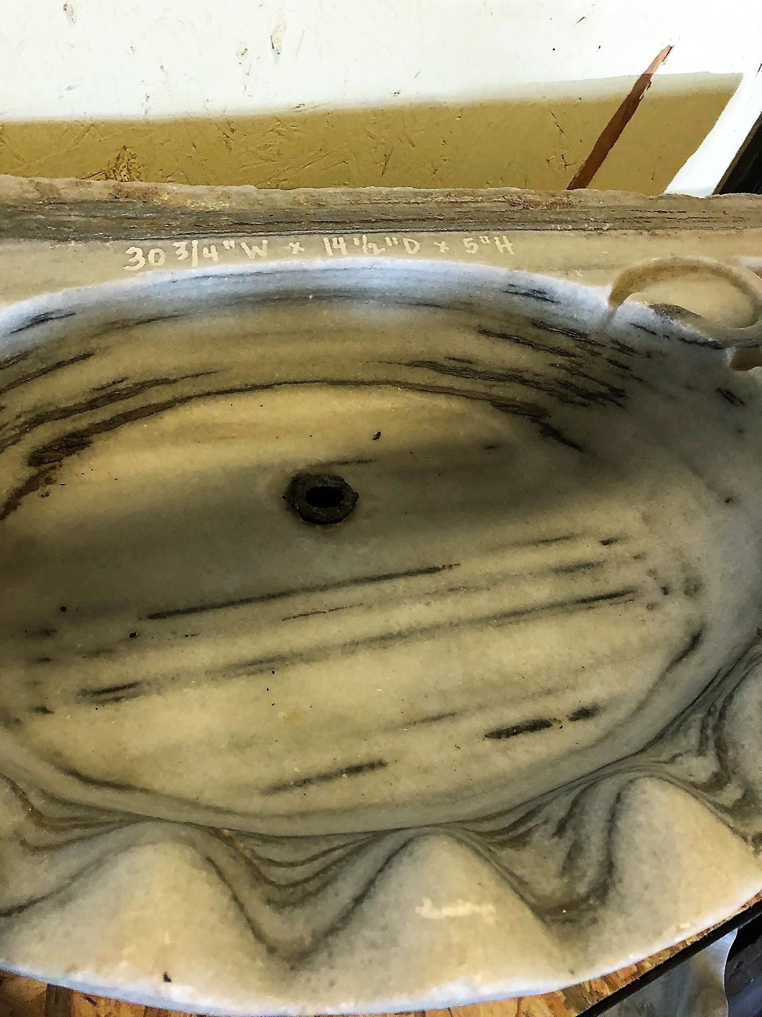 Antique marble sink.

Origin: Greece

circa 1820s.

Measurements:

30 3/4