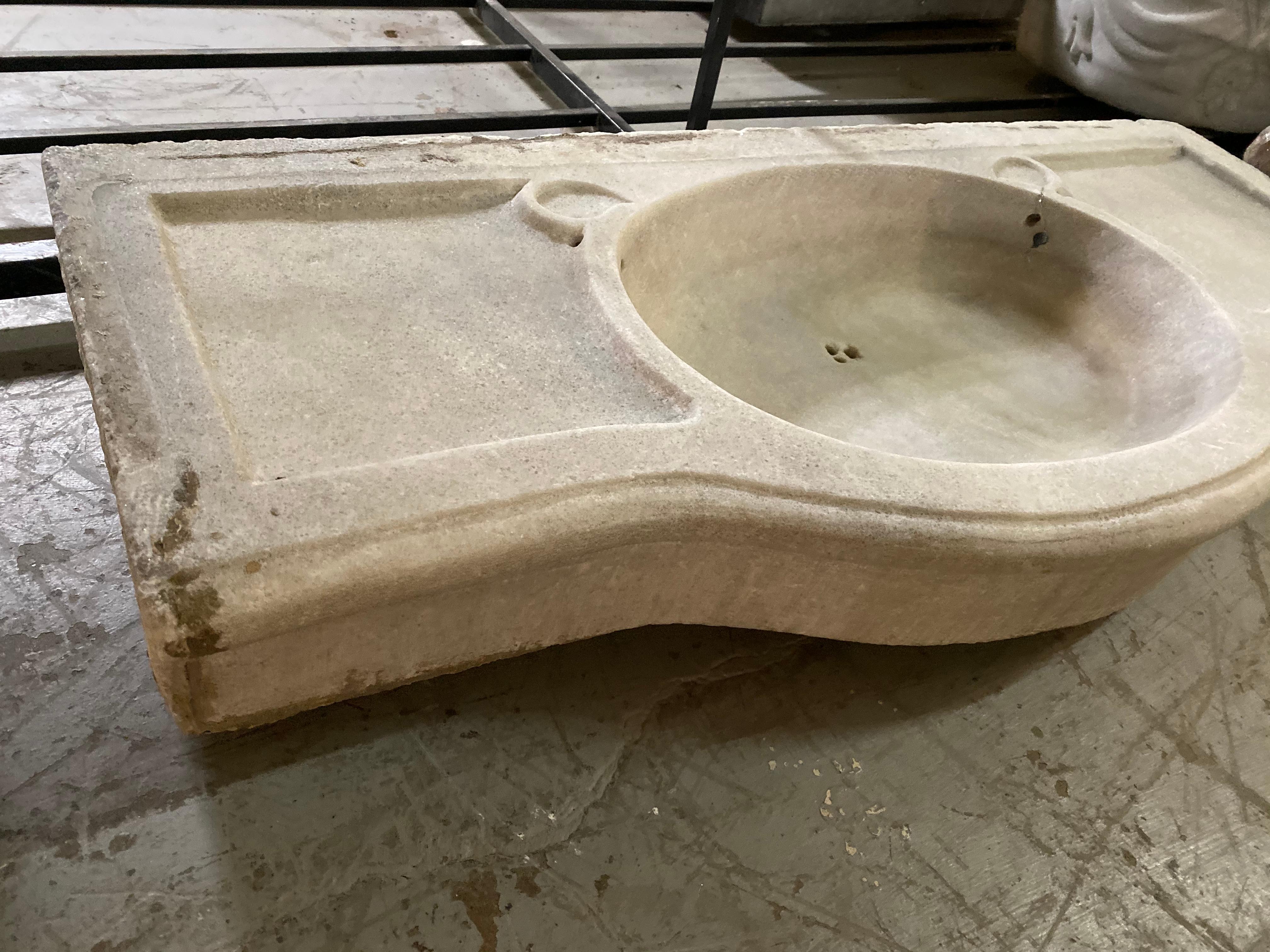 This antique marble sink originates from Greece, circa 1850. 

Measurements: 16'' D x 37.5'' W x 5'' H.