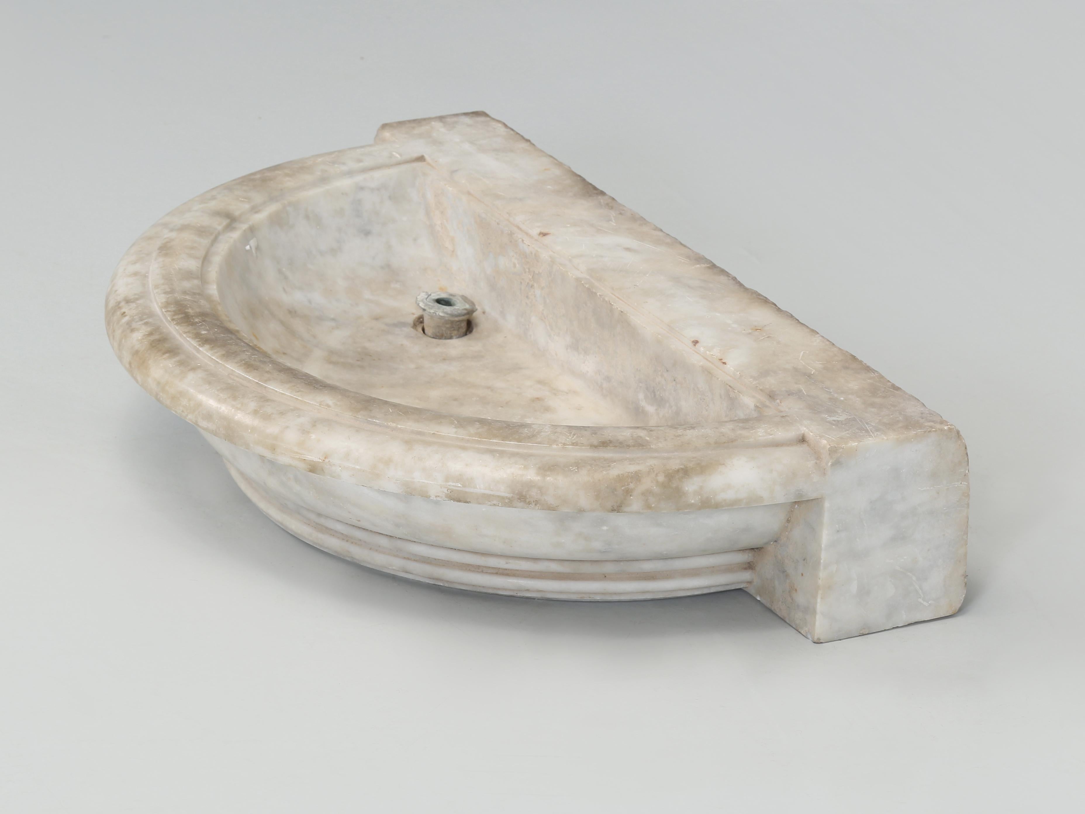 Antique Marble Sink from the Toulouse Region of France. Although we consider ourselves fairly decent at estimating when something was made, to be honest we are at a loss for this one. There is no question that the small Stone (marble) Sink was