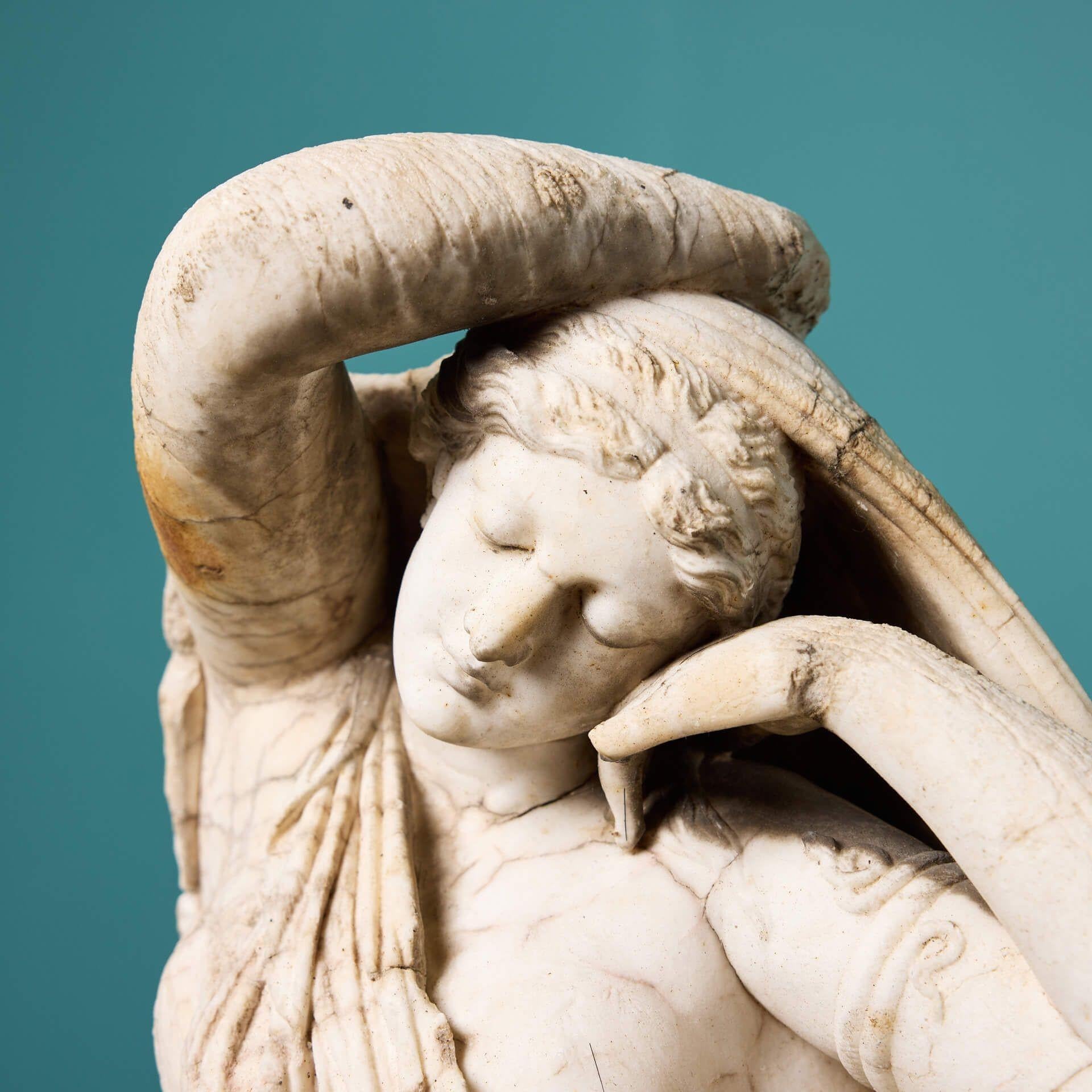 This late Georgian antique marble statue is after the antique, depicting a scale fragment of the eminent 2nd century statue ‘Sleeping Ariadne’. Circa 1780, this carved white marble sculpture is over 240 years old and depicts Ariadne’s torso as she