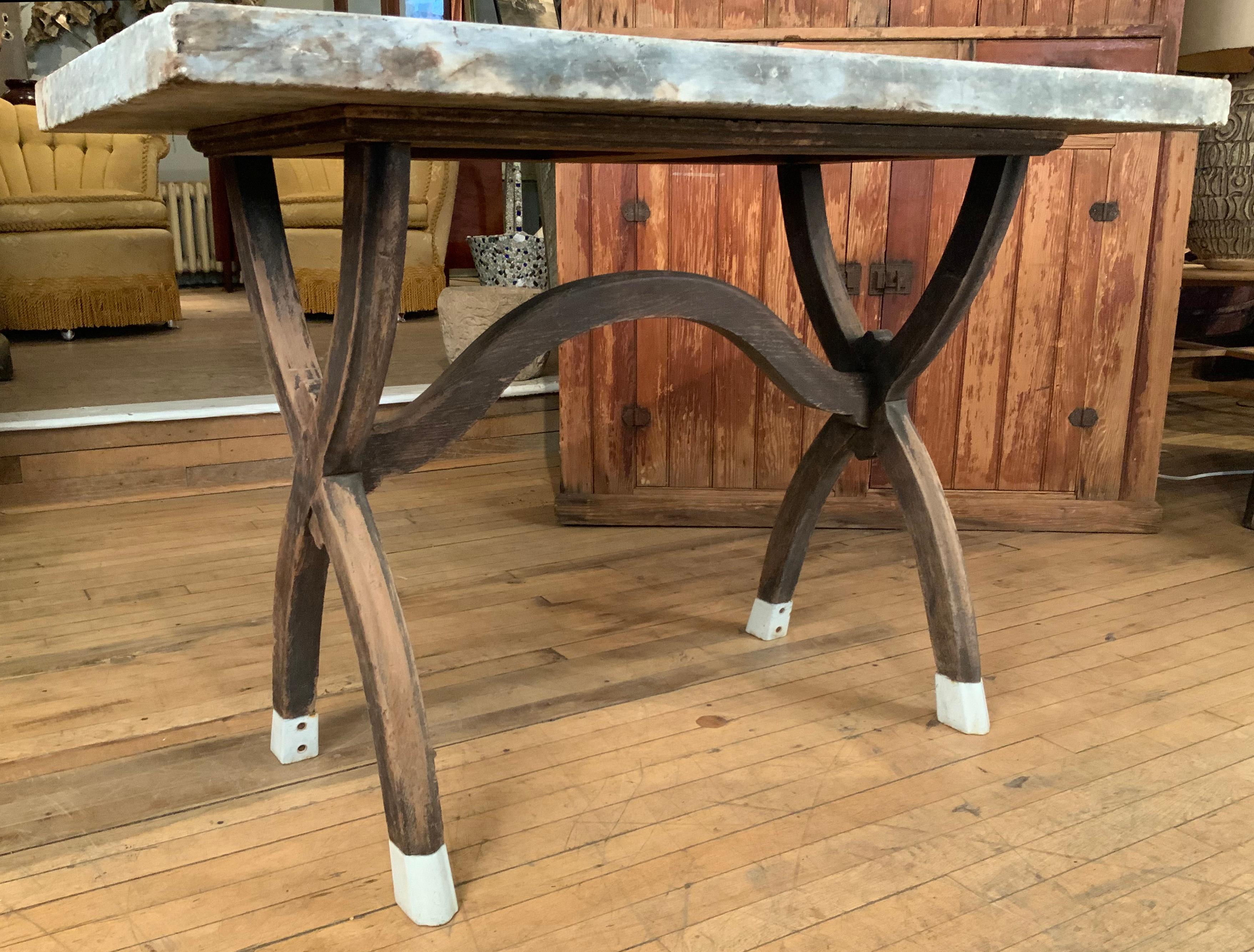 Antique Marble Top Table with Curved X Base and Enamel Feet In Good Condition In Hudson, NY