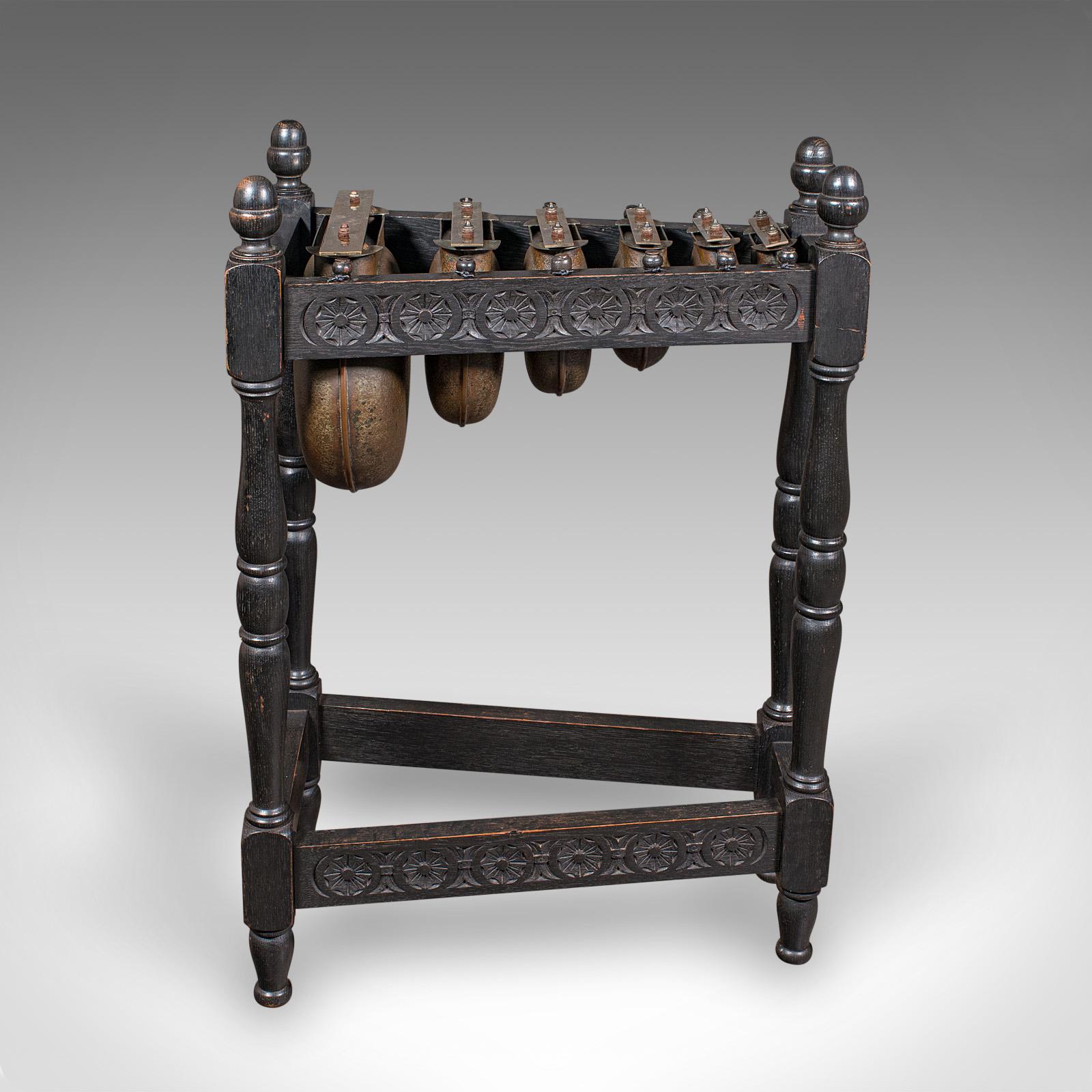This is an antique marimbaphone. An English, brass and oak decorative musical instrument, dating to the early 20th century, circa 1920.

A striking, concussive idiophone with beautiful harmonics and quality finish
Displays a desirable aged patina