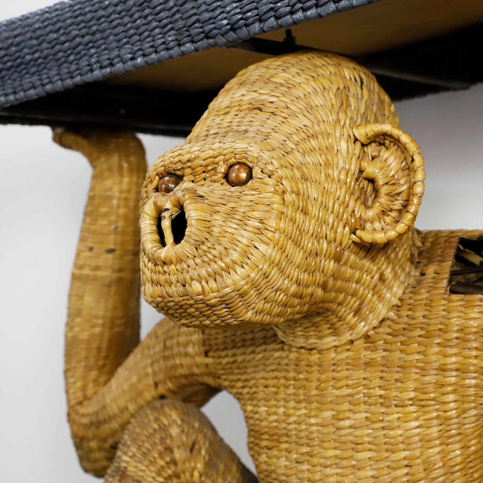 Circa 1970, we offer this Antique Original Mario Lopez Torres Monkey Console, made in natural woven and iron structure, Hecho en Mexico. The console presents some missing typical of the age.
