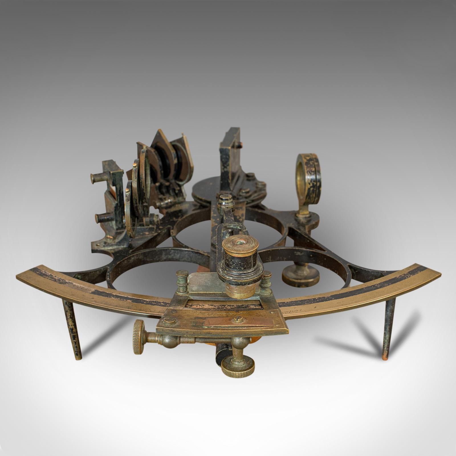 This is an antique maritime sextant. An English, brass admiralty three circle naval instrument, by J.Coombes of Devonport, dating to the Victorian period, circa 1900.

Appealing Victorian scientific instrument
Displays a desirable aged