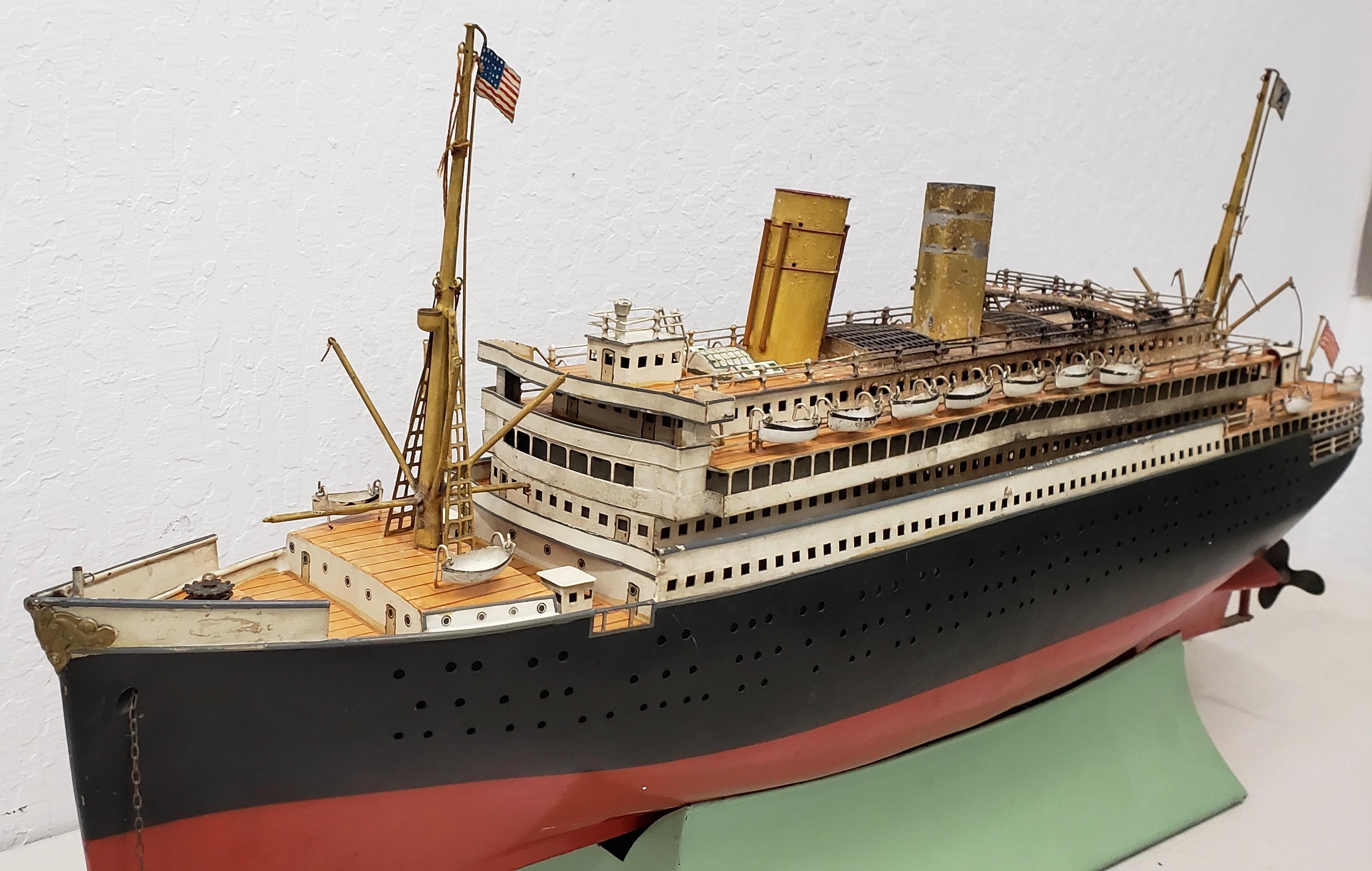 Antique Marklin Ocean Liner with American flags and lifeboats circa 1900
Original Travel Agency Model - No Motor - Wired Interior for Lighting

Antique Marklin Ocean Liner with American flags and lifeboats circa 1900

There are 12 lifeboats and