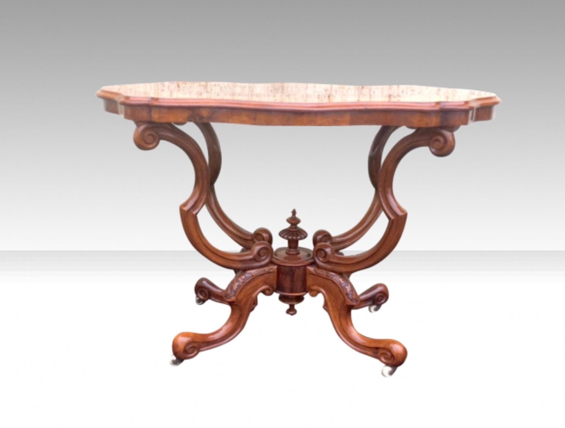 Magnificent antique marquetry inlaid burr walnut window table, occasional table with cradle base and shaped oval top
Circa 1860
Measures: 41 ins. wide x 24 ins. deep x 29 ins high.