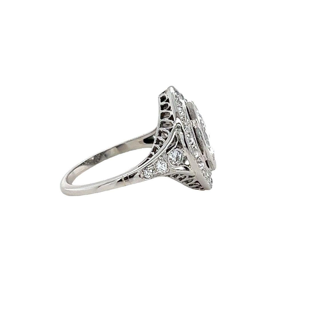 Marquise Cut Antique marquise halo diamond ring in platinum For Sale