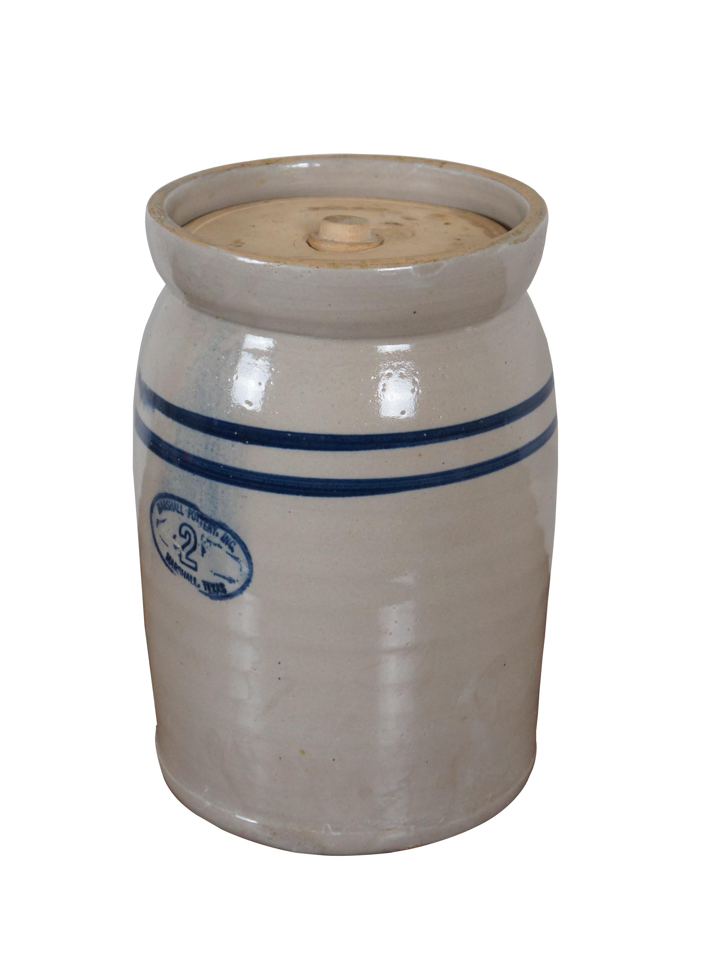 Antique Marshall Pottery 2 gallon butter churn / lidded crock. Traditional light gray salt glaze finish with two blue stripes near the top.

