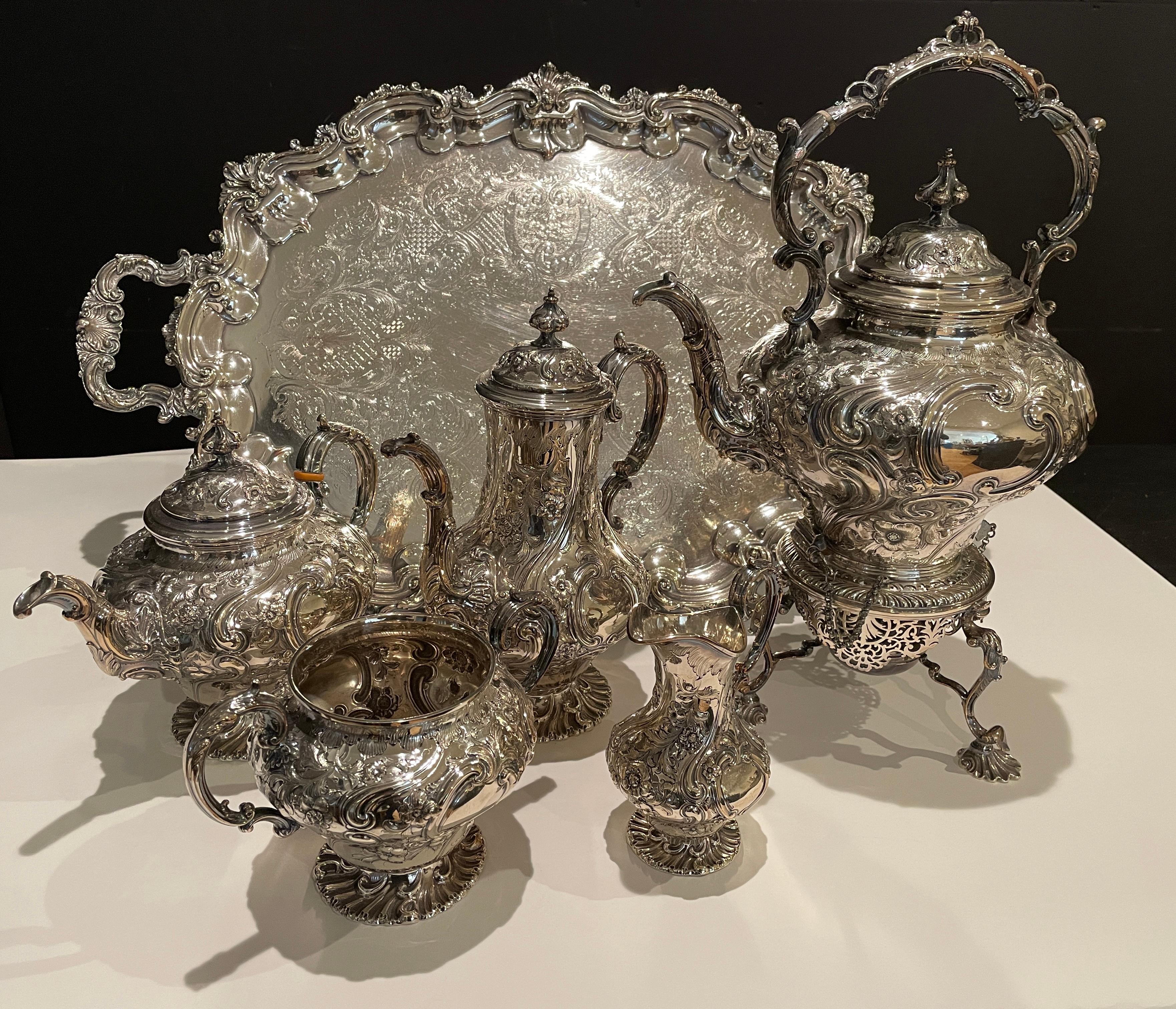Fine quality English Rococo-style 6-piece Martin Hall & Co. silver plate tea/coffee set with associated tray. Large tray with coffee and tea pot, sugar and creamer and large tipping kettle on tripod stand. Fully marked with the addition of the