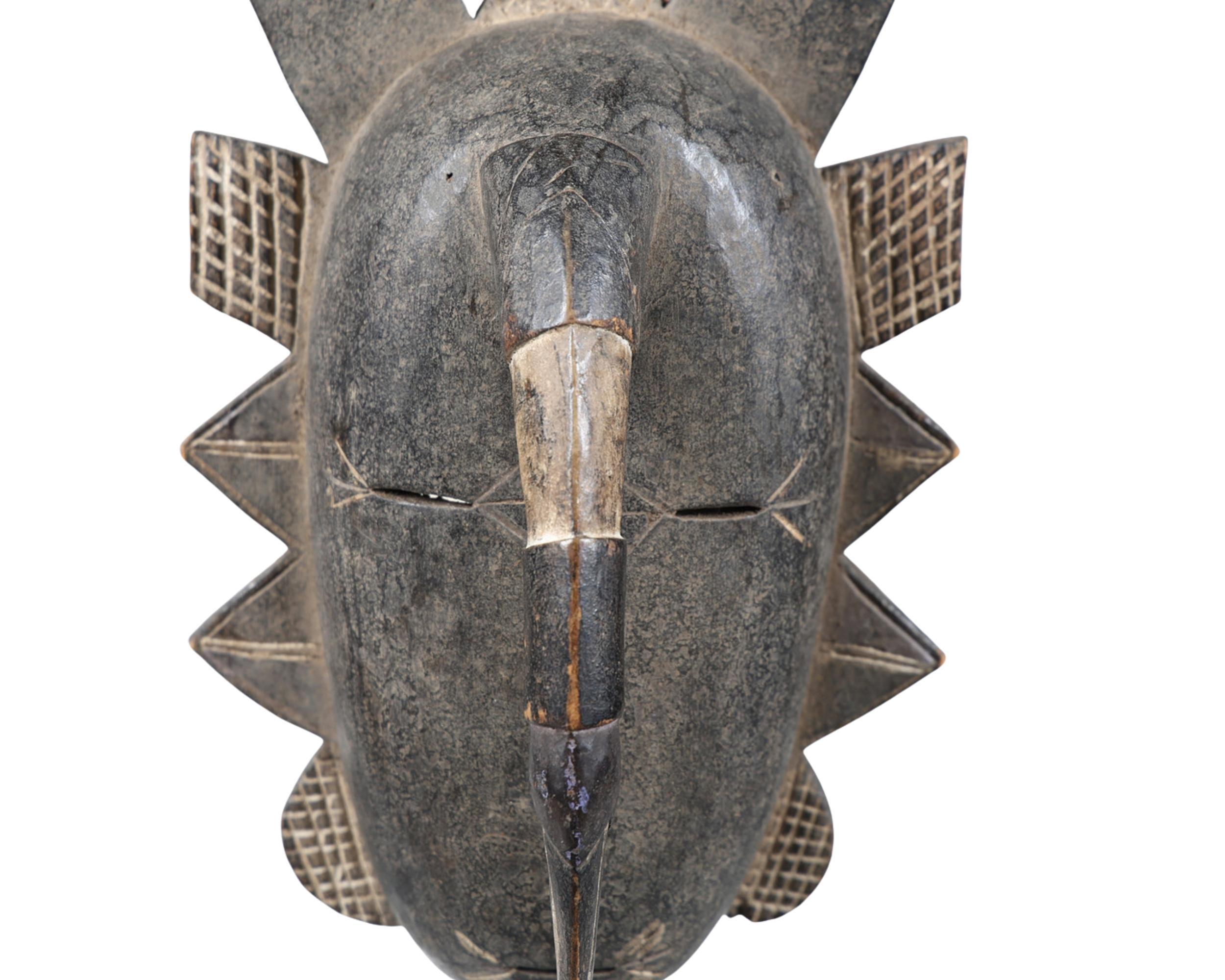 Bronzed Antique Baule Tribal Horned Mask from Ivory Coast, Hand-Carved African Wood Art For Sale