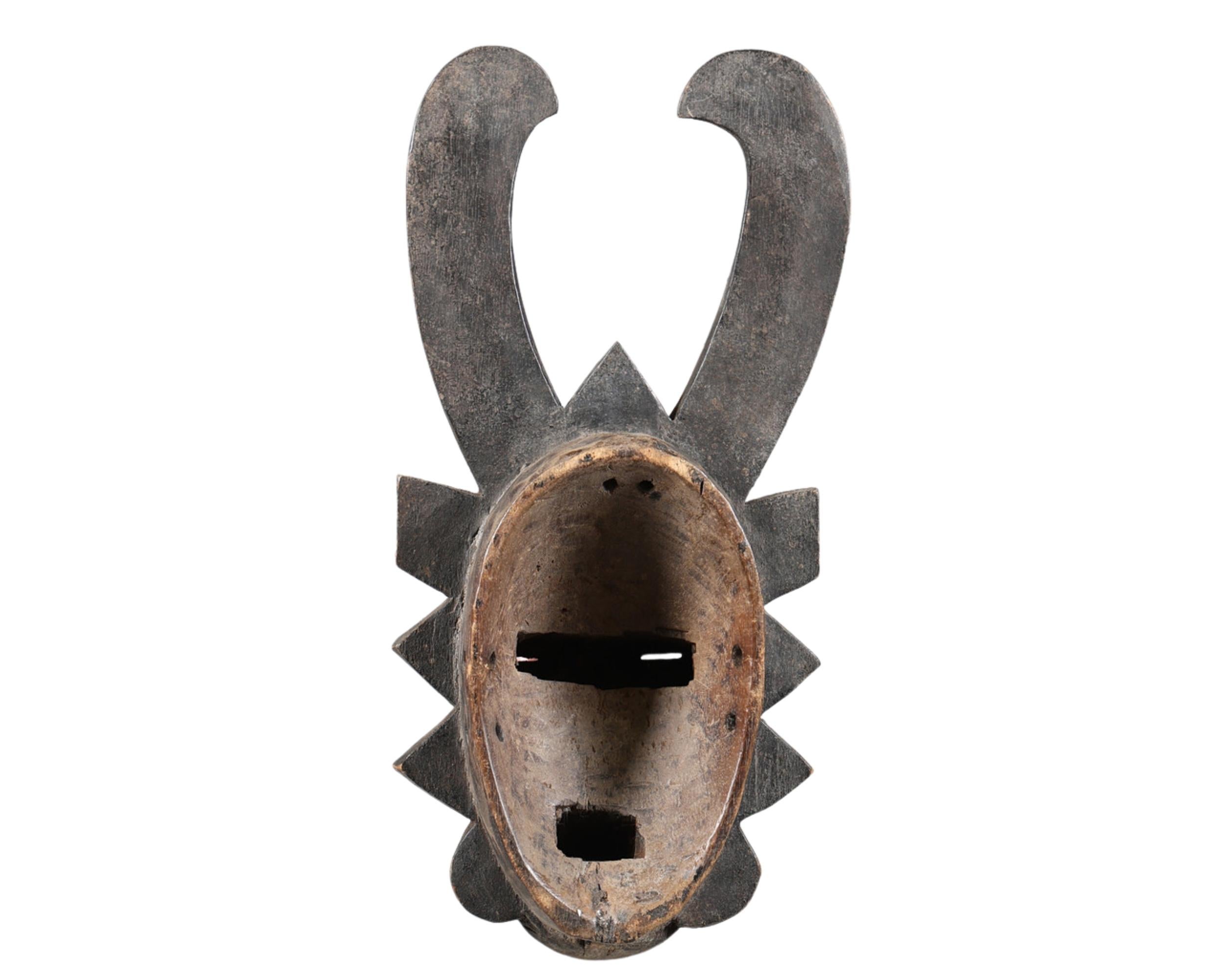 Early 20th Century Antique Baule Tribal Horned Mask from Ivory Coast, Hand-Carved African Wood Art For Sale