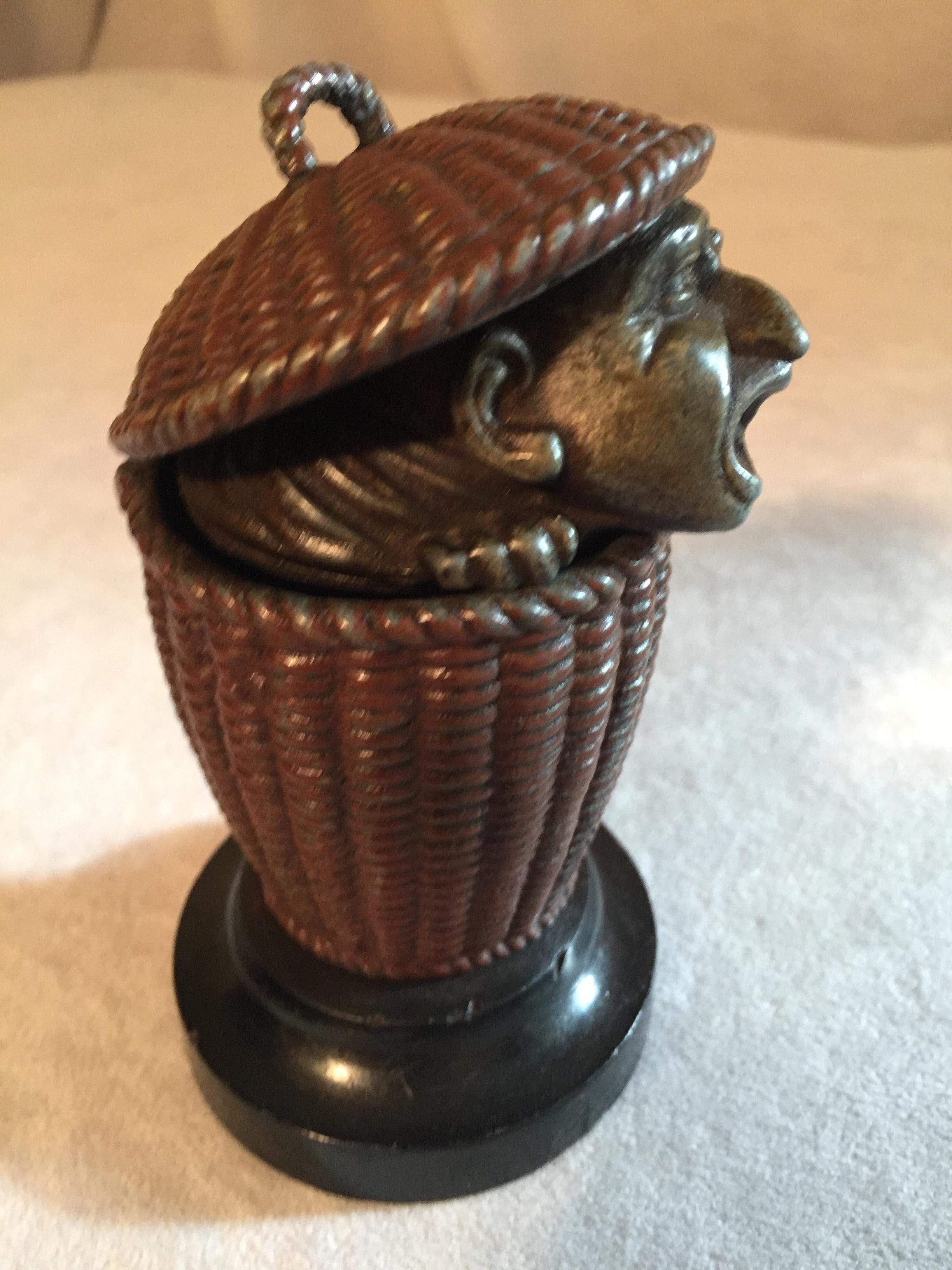 Hand-Crafted Antique Match Safe with Man Peeking Out of a Basket