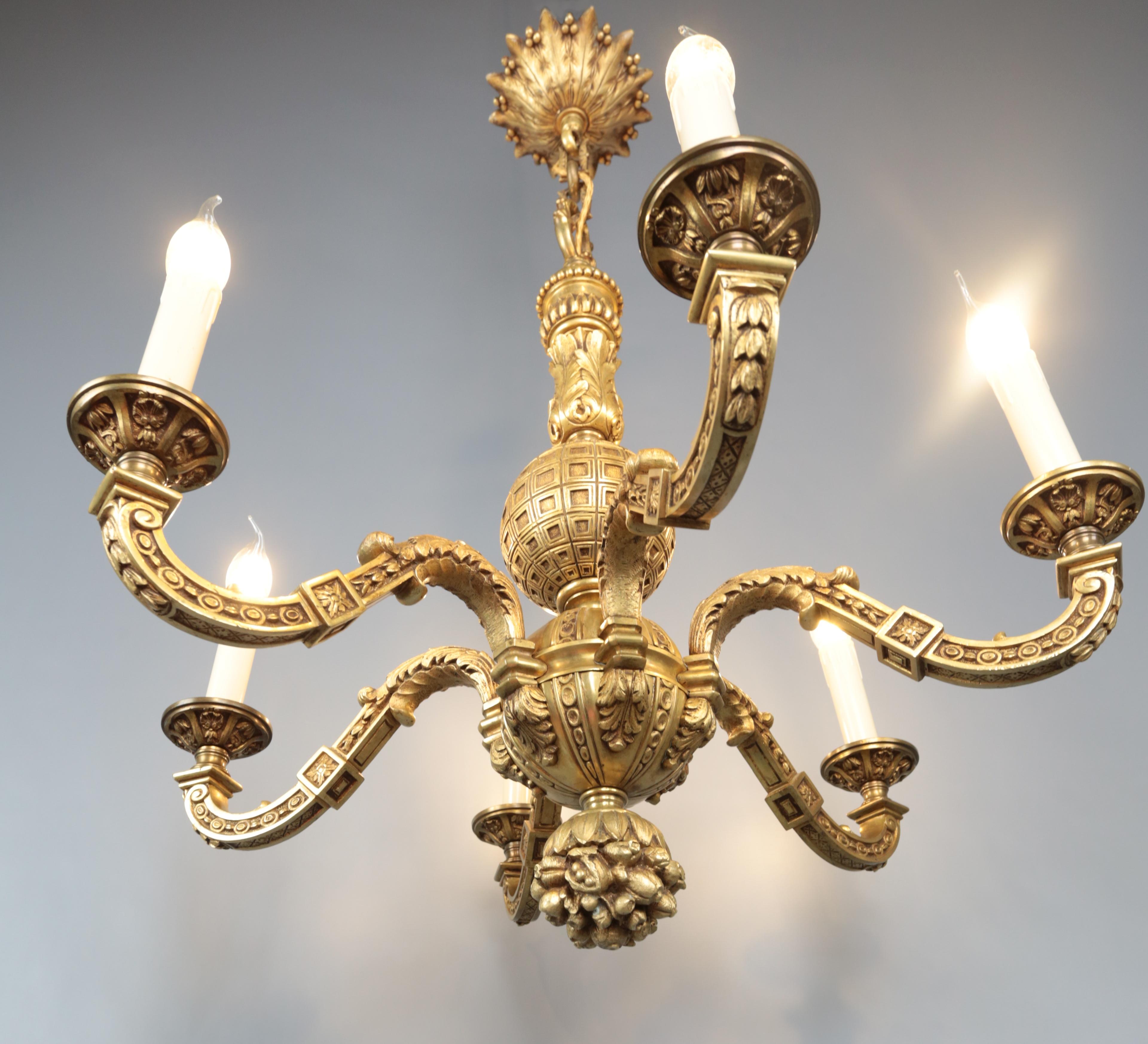 Antique Mazarin Pineapple Chandelier

Six-armed antique Louis XIV gilt bronze chandelier with pineapple motif. Top quality workmanship. A rarer type of Mazarin chandelier. The chandelier has a new supply cable in the old style with fabric covering