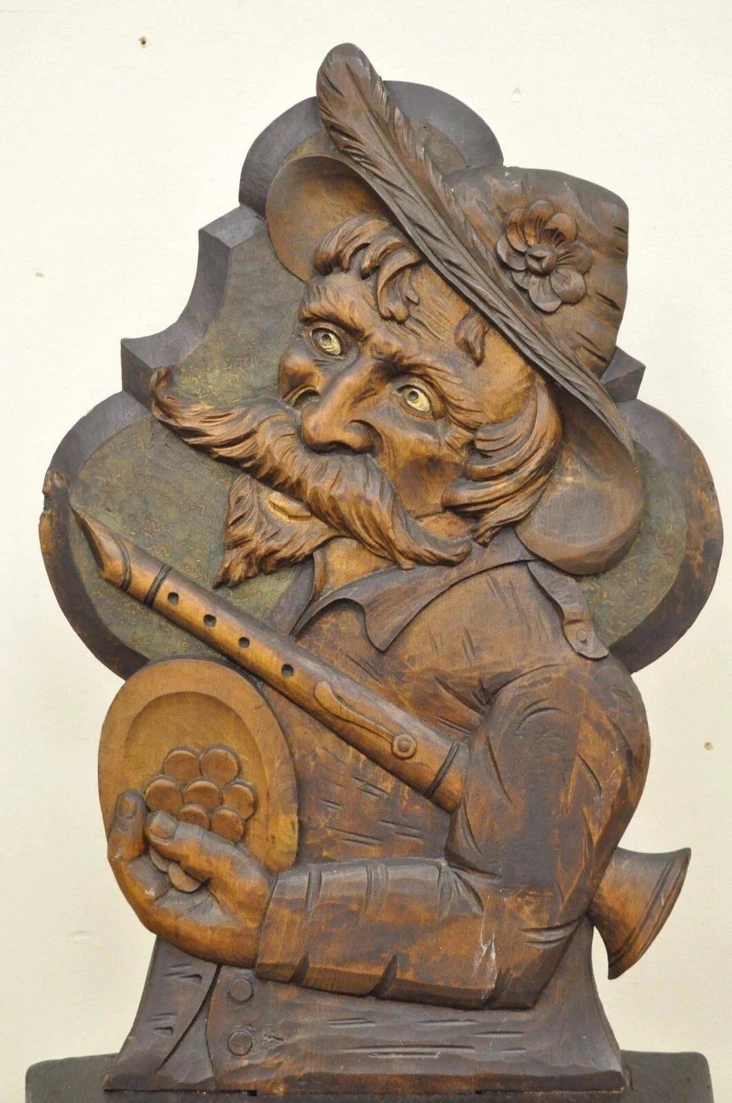 Antique European Medieval Gothic Hand Carved Wood Figural Musician Bard Tavern Side Chair. Circa Late 19th Century. Measurements: 39.5