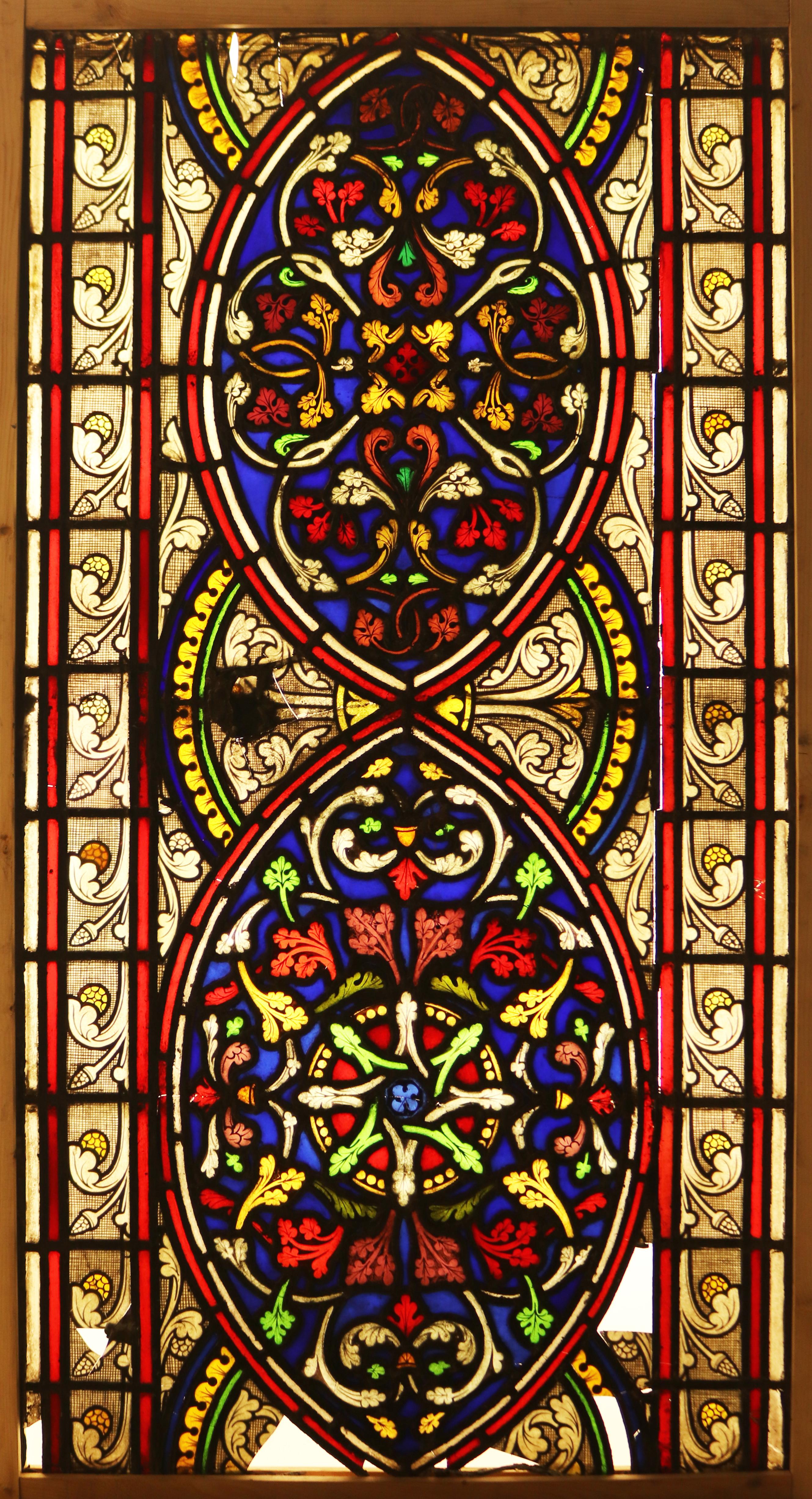 A reclaimed English stained glass window panel in the Medieval style with vibrant colours.

Additional Dimensions

Overall 122.5 x 68 x 1 cm