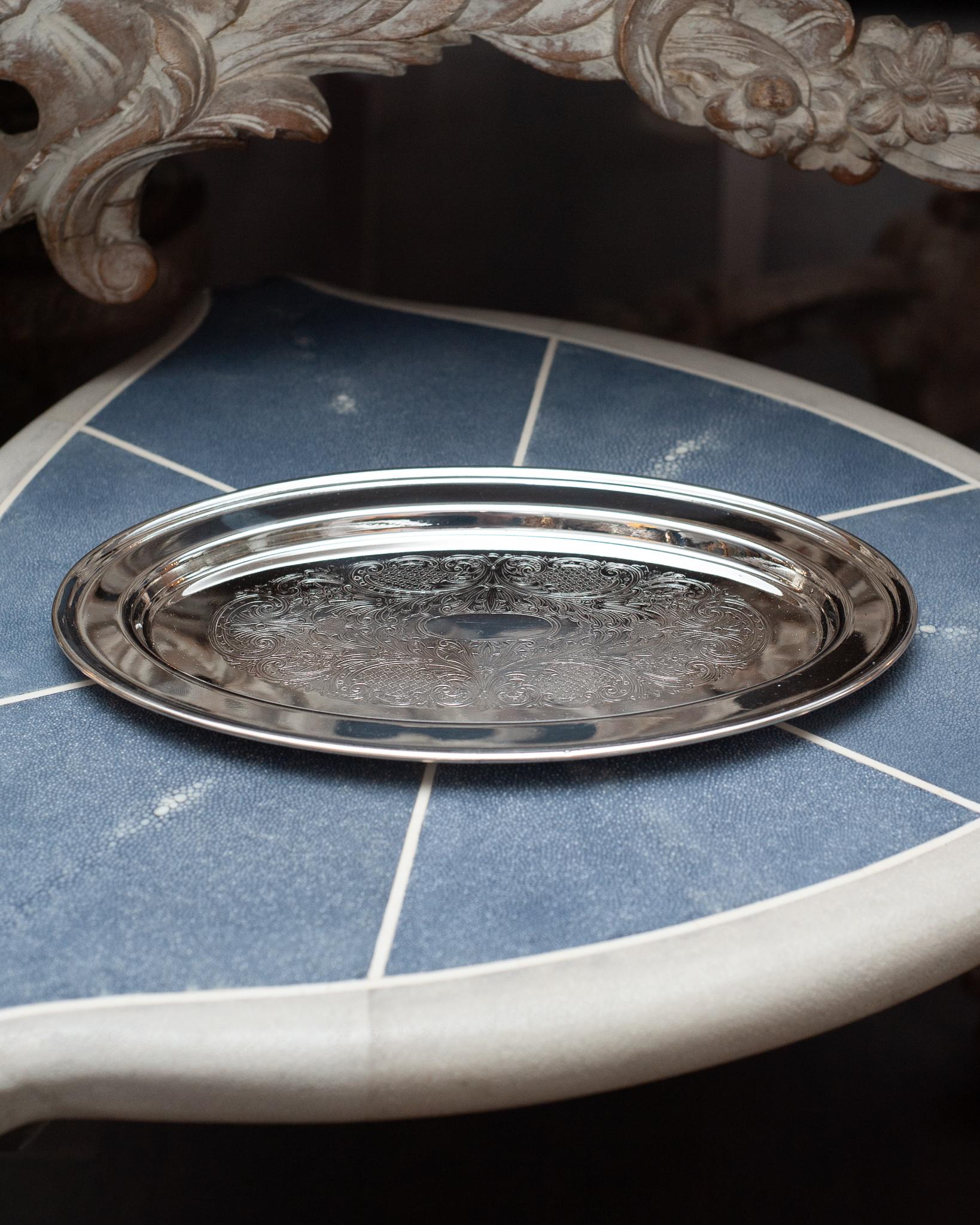 An antique medium Viking Silver silver-plate oval serving tray with engraving interior. Silver plated copper.