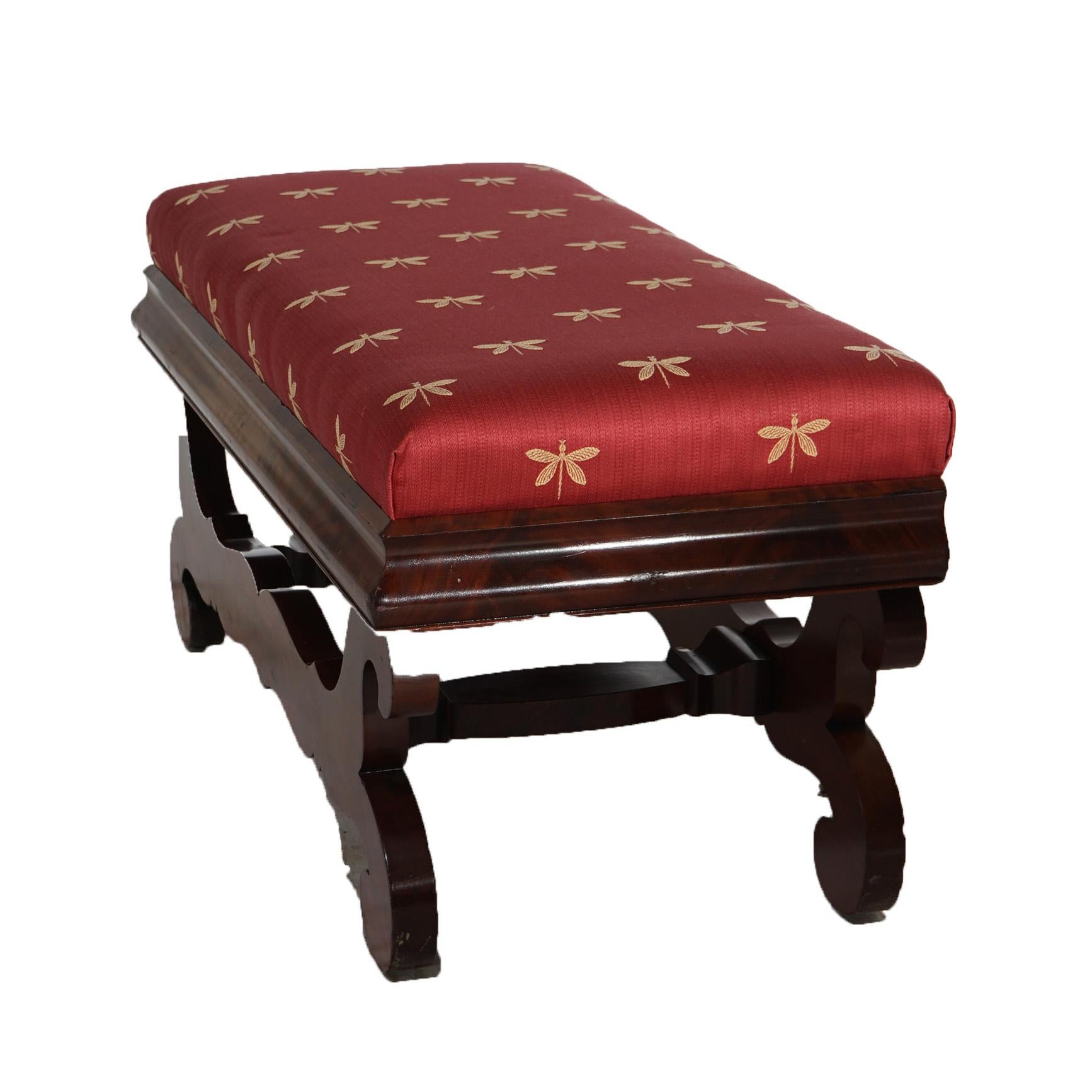 An antique Greco American Empire long bench in the manner of Meeks offers upholstered seat over stylized scroll form trestle base, c1840

Measures- 18.5''H x 39.75''W x 17.75''D