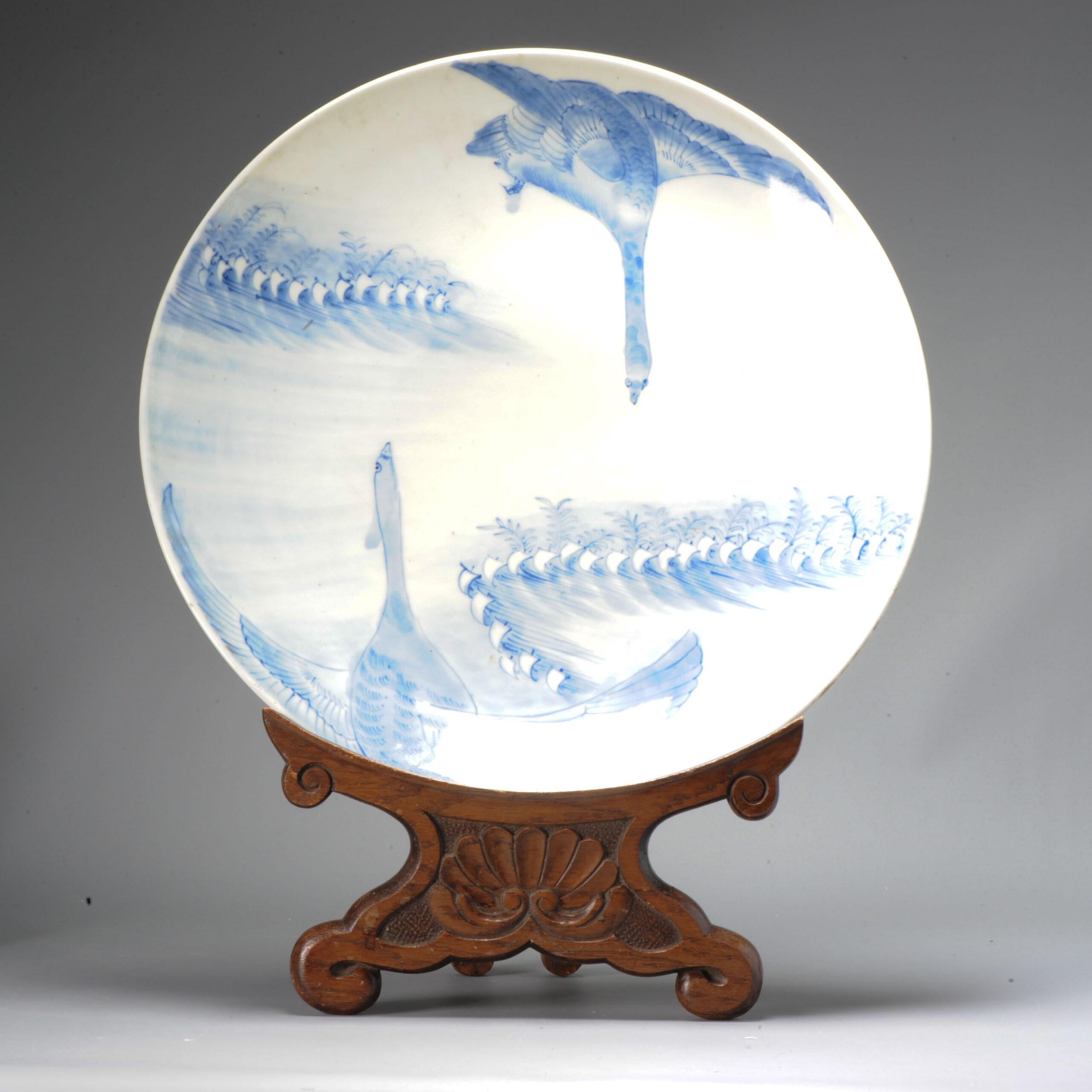 Haring with you this very nice piece with what seems to be 2 flying swans. They could also be Geese.

Unmarked at base.

Condition
Perfect, just some frits to base rim. Size: 375 x 55 mm diameter x height.
Period.
19th Century.
20th Century