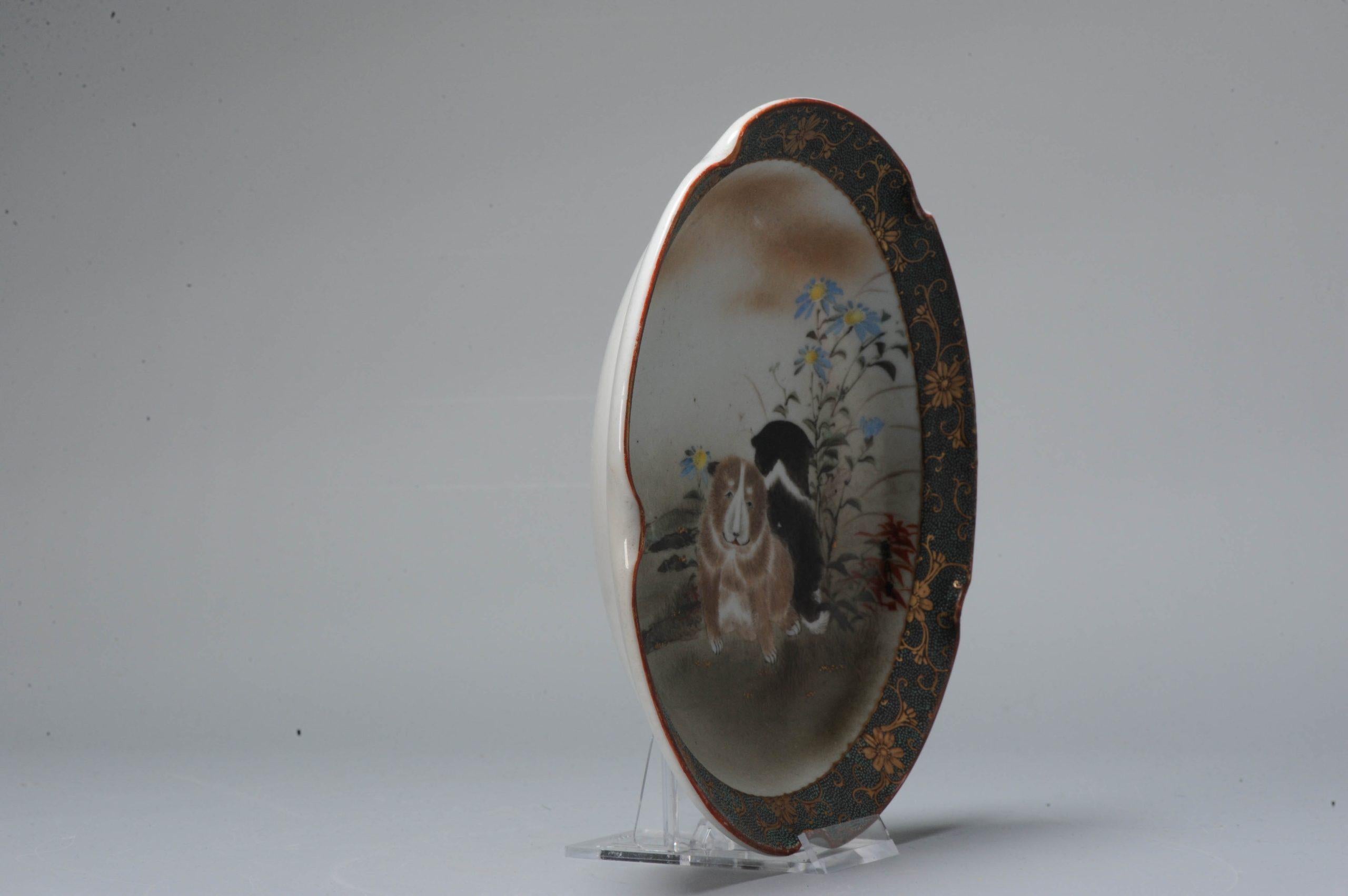 Faboulous japanese porcelain plate with unusual design of small dogs. Very high quality painting.

Mark at the base.

Additional information:
Material: Porcelain & Pottery
Type: Bowls
Japanese Style: Kutani
Region of Origin: Japan
Period: 20th
