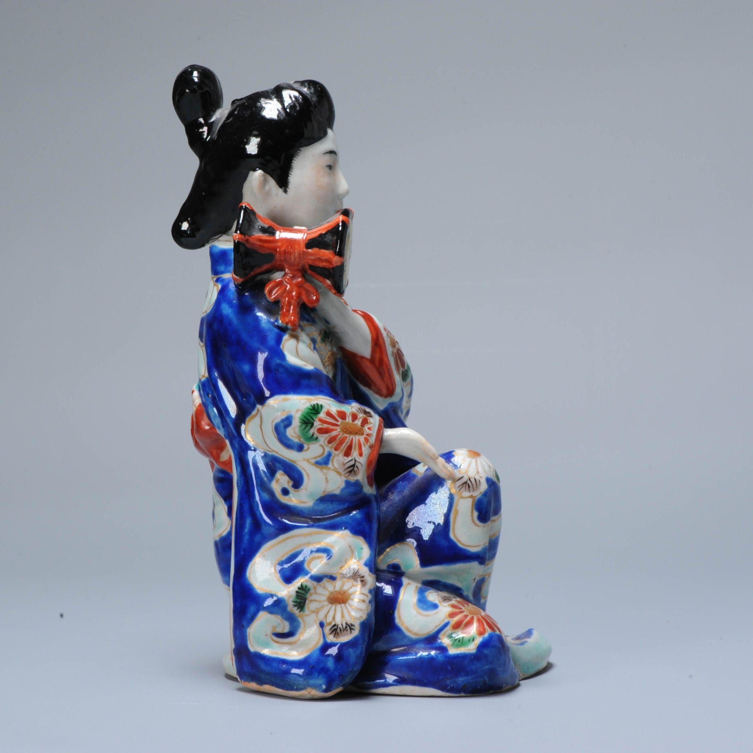 Antique Japanese Kutani Porcelain Statue of and Elegant lady
Unmarked.

Additional information:
Material: Porcelain & Pottery
Type: Statues
Japanese Style: Kutani
Region of Origin: Japan
Period: 19th century Edo Period (1603–1867), Meiji Periode