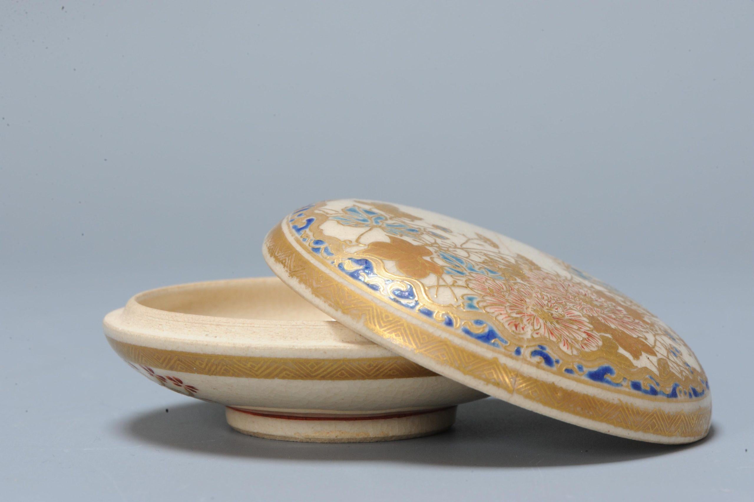 Fabulous Japanese earthenware Satsuma lidded box with nice decoration of flowers. Marked at base and also with Gosu Blue. Meiji period, 19th c

Lovely piece.

Additional information:
Material: Porcelain & Pottery
Type: Plates
Japanese Style: