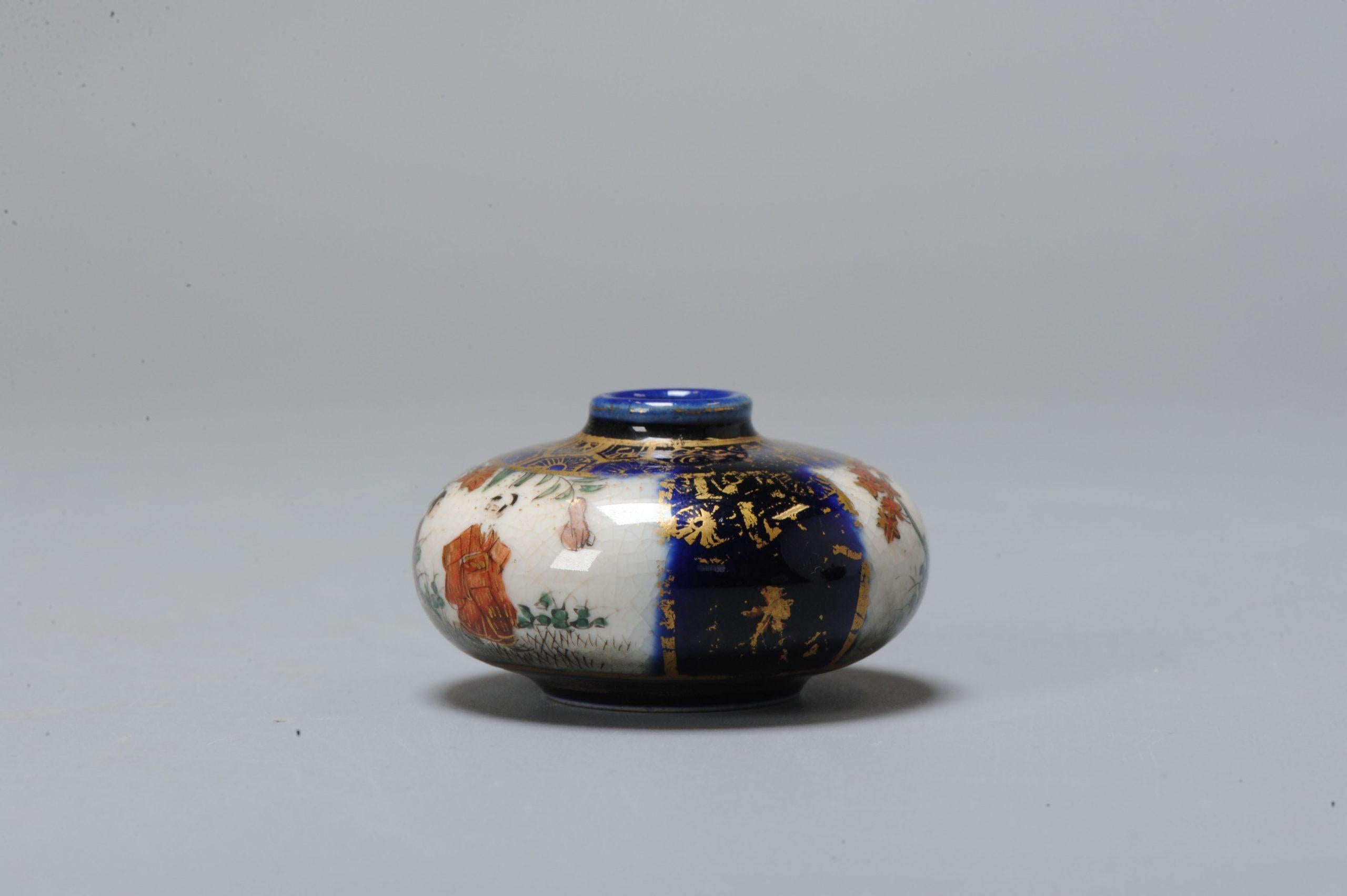 Fabulous Japanese earthenware Satsuma vase with nice decoration of flowers and figures decoration marked. Meiji period, 19th c

Lovely piece.

Additional information:
Material: Porcelain & Pottery
Type: Plates
Japanese Style: Satsuma
Region of