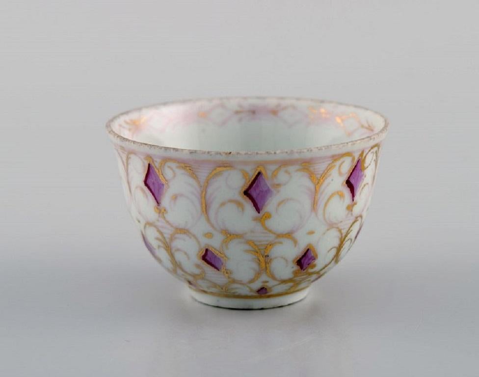 Antique Meissen cup in hand-painted porcelain with purple and gold. 
Marcolini period 1774-1814. 
Museum quality.
Measures: 6 x 3.8 cm.
In excellent condition with light wear in the gold.
Stamped.
1st factory quality.