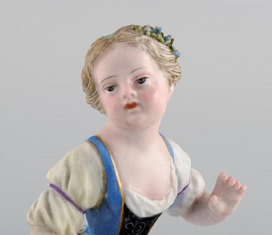 Antique Meissen figure in hand painted porcelain. Girl with flowers. Late 19th century.
Measures: 12.5 x 7 cm.
In excellent condition with minimal chips on the flowers.
Stamped.
1st factory quality.