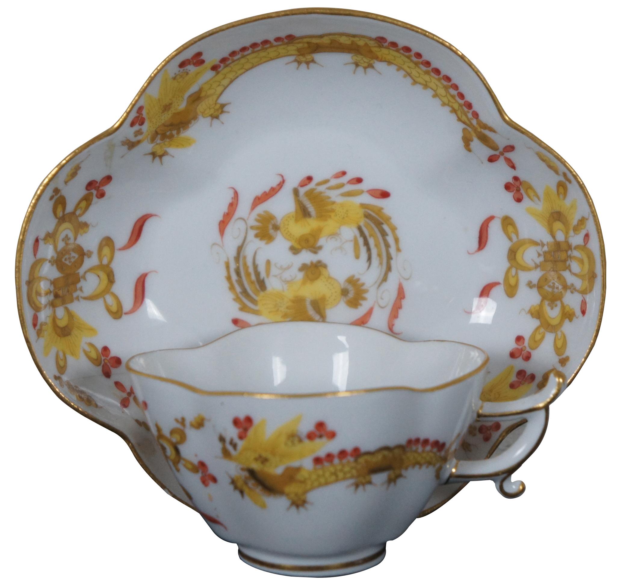 Antique Meissen scalloped porcelain demitasse cup and saucer, numbered B117 with gold and red dot Chinese Court dragons.

Measures: Saucer - 4.75” x 4.5” x 1.125” / Teacup - 3.5” x 2.625” x 1.75” (Width x Depth x Height) 5