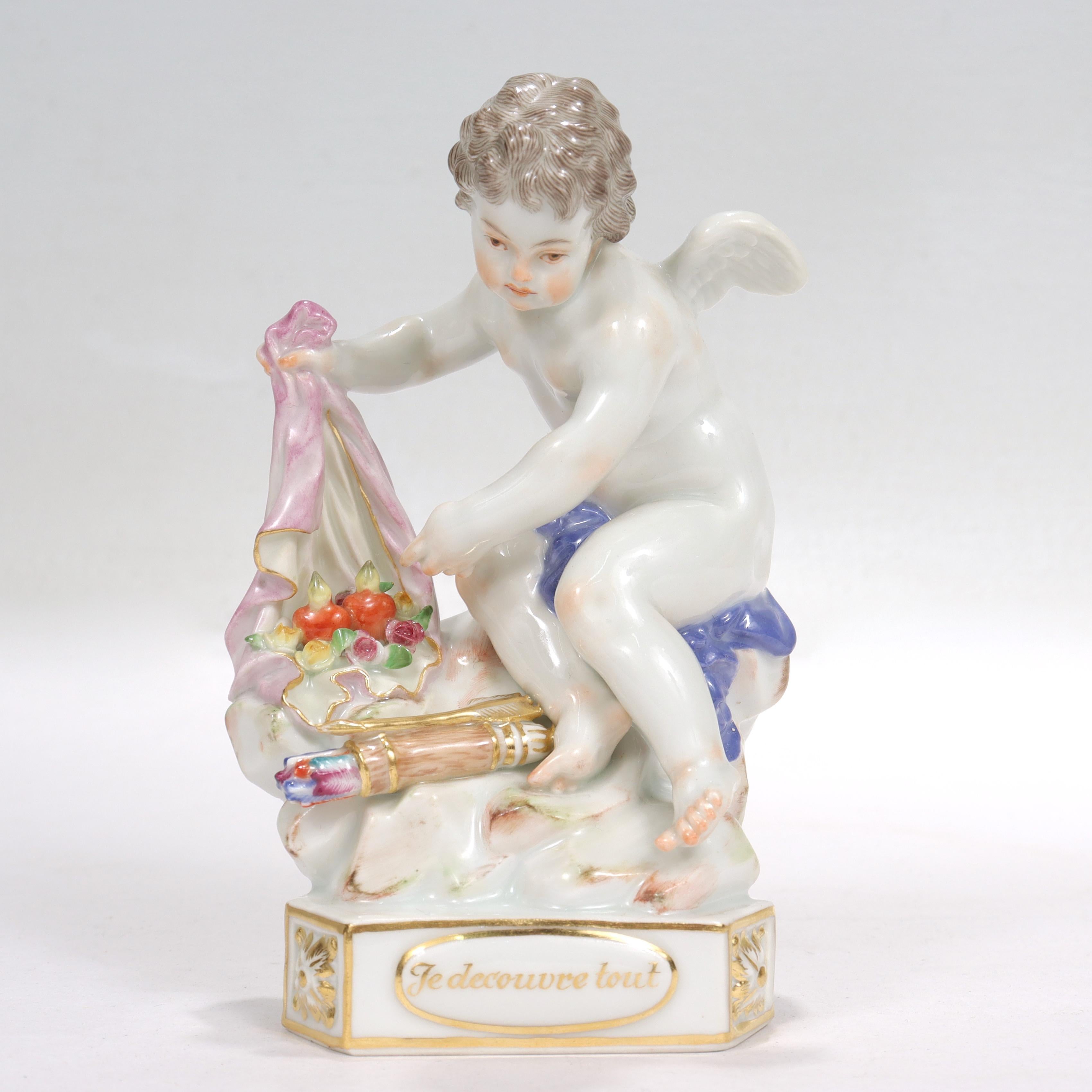 A fine antique porcelain Cupid figurine. 

By Meissen. 

Model no. F13 from the Cupid Motto Series.

Entitled 