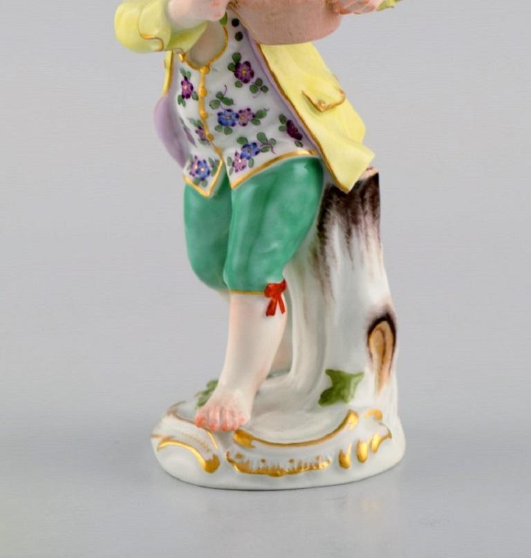 Rococo Revival Antique Meissen Porcelain Figurine, Boy with a Flower Basket, Model 149 For Sale