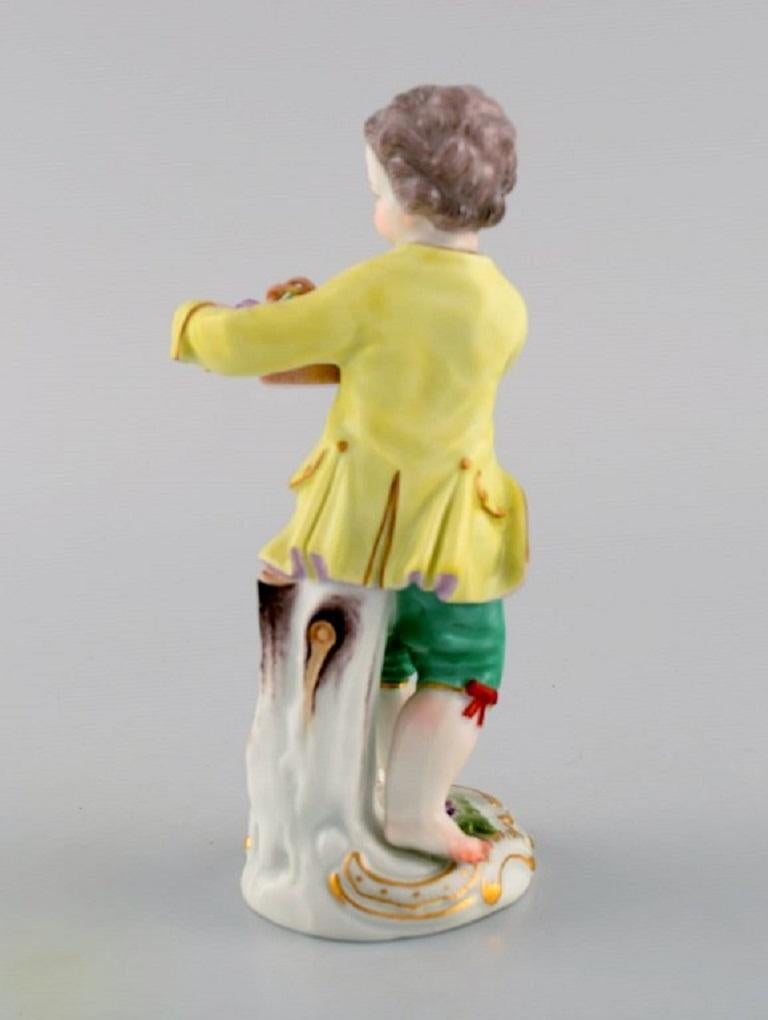 Hand-Painted Antique Meissen Porcelain Figurine, Boy with a Flower Basket, Model 149 For Sale
