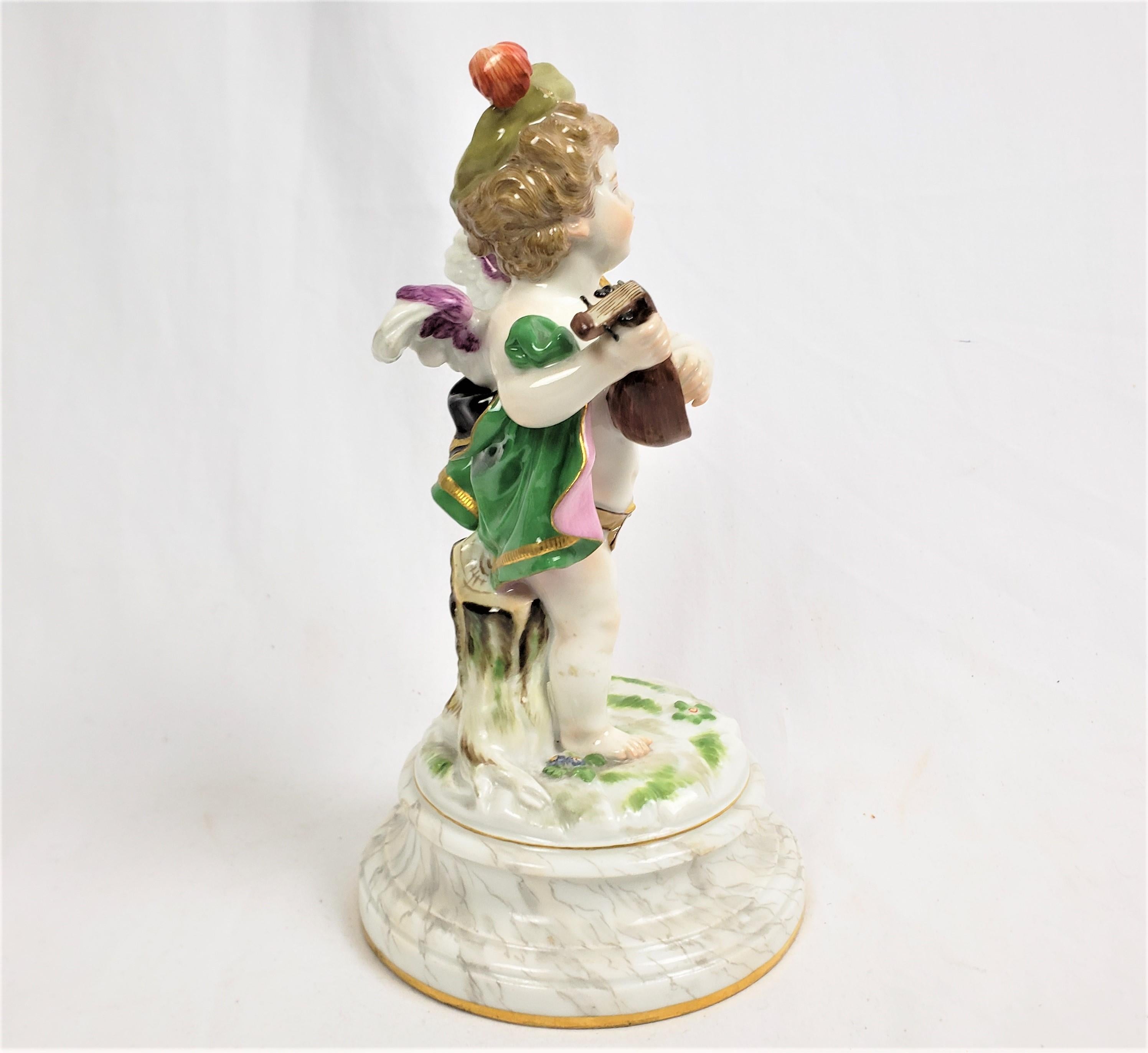 Hand-Painted Antique Meissen Porcelain Figurine of a Child Playing a Lute For Sale