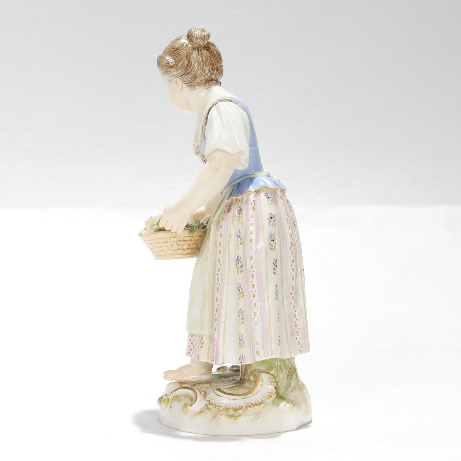 Painted Antique Meissen Porcelain Figurine of a Girl with Flower Basket For Sale