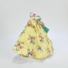 Figurine ancienne en porcelaine de Meissen représentant des amants en crinoline intitulée "Le Baiser"