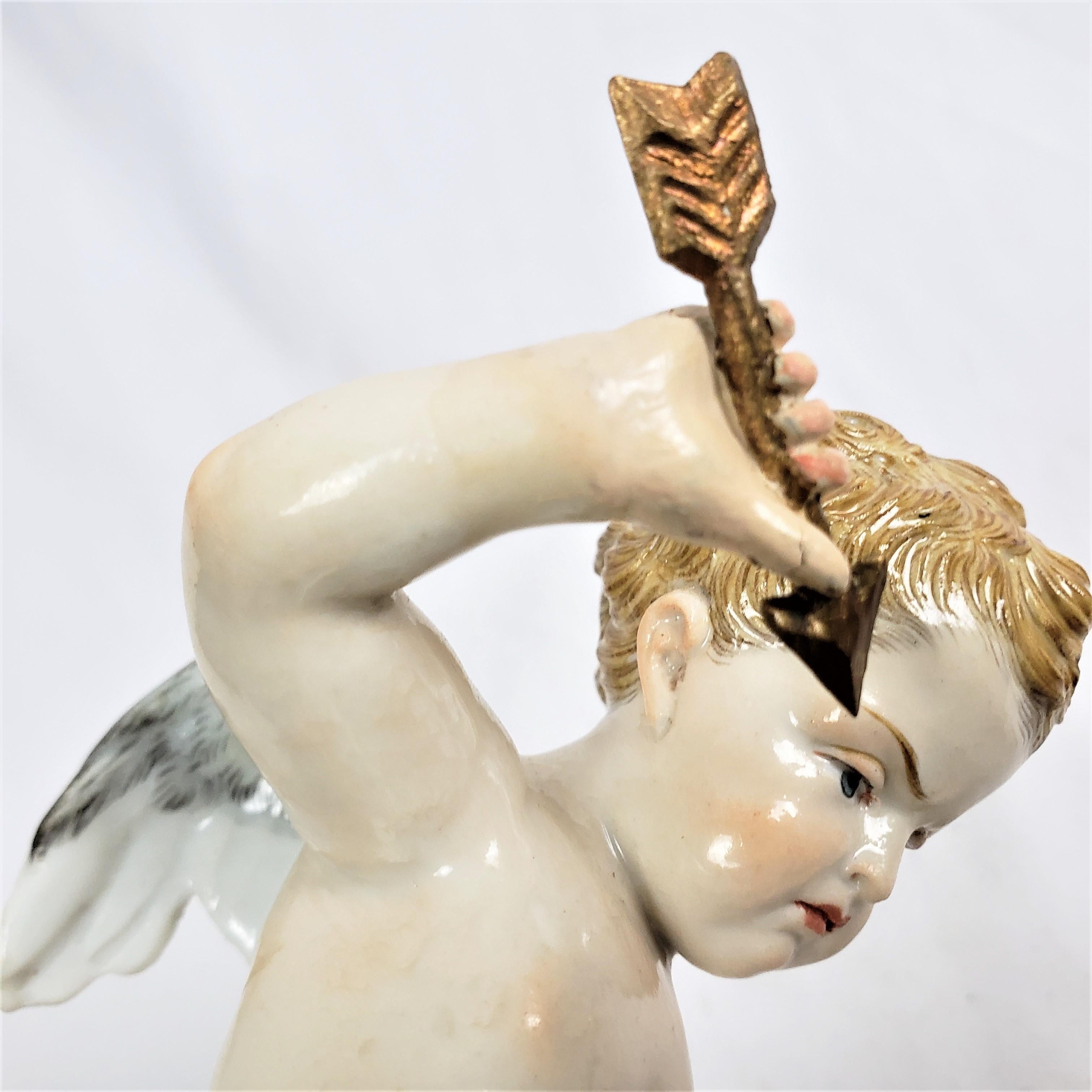 Antique Meissen Porcelain Figurine of Cupid Holding an Arrow & Flaming Heart For Sale 3