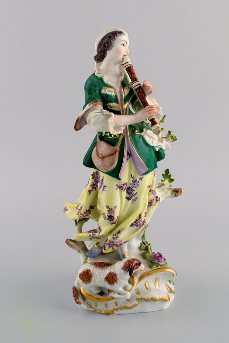 Allemand Figurine ancienne en porcelaine de Meissen, femme jouant de la flûte, fin du 19ème siècle en vente