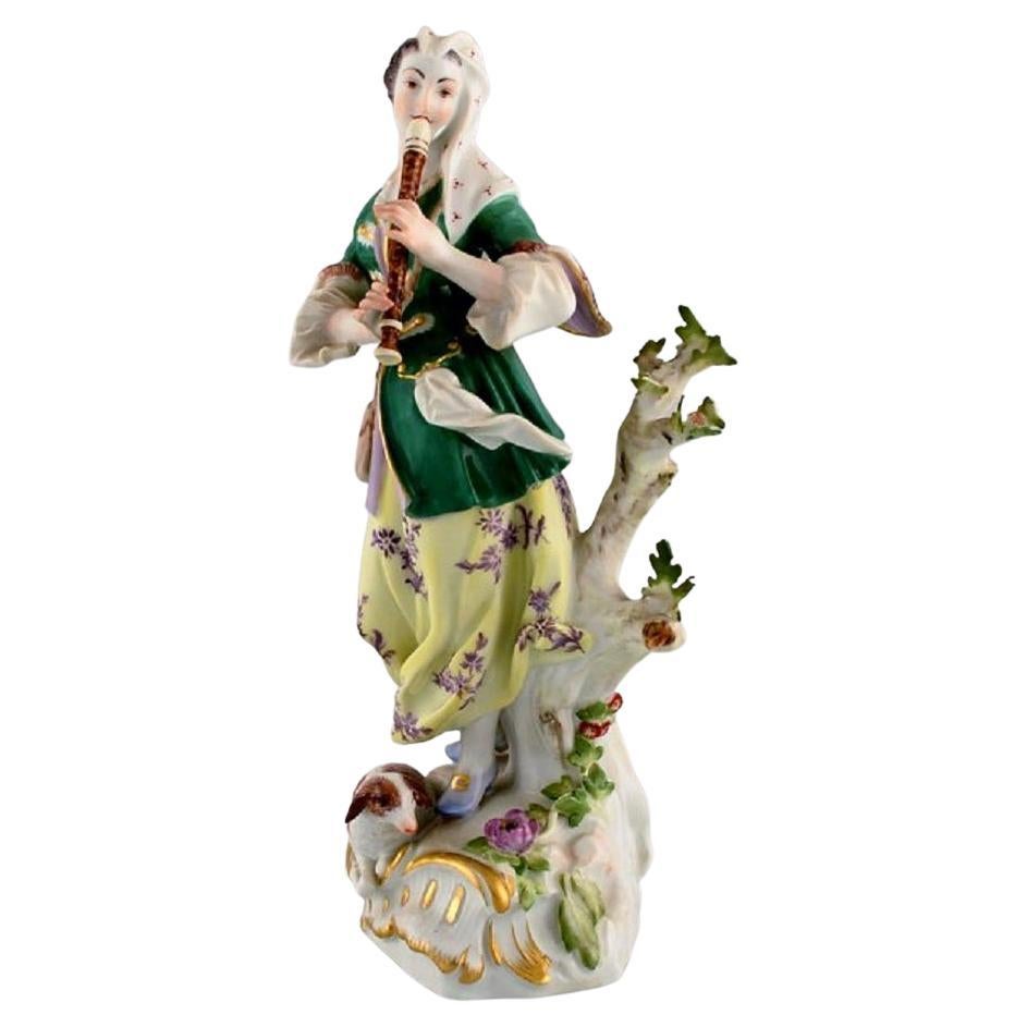 Figurine ancienne en porcelaine de Meissen, femme jouant de la flûte, fin du 19ème siècle
