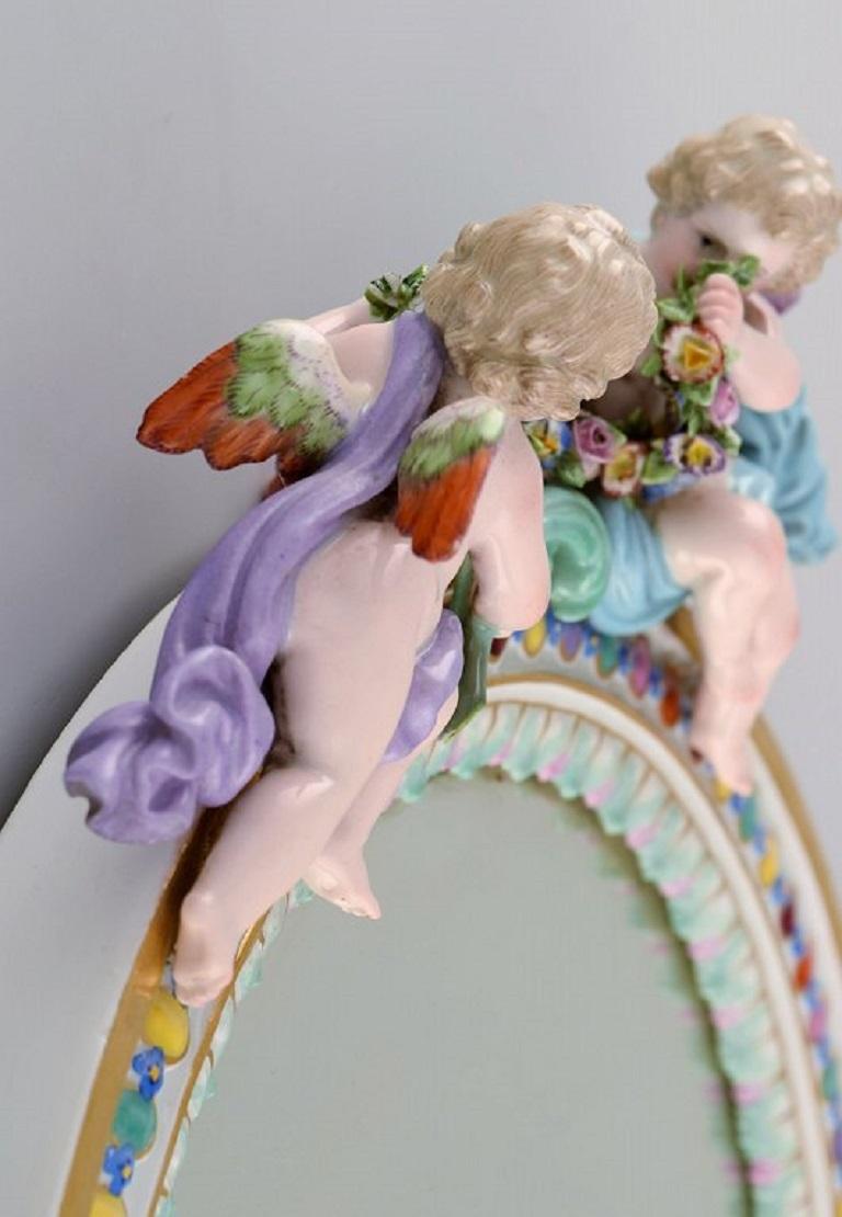 Hand-Painted Antique Meissen Porcelain Mirror with Original Glass. Decorated with Putti