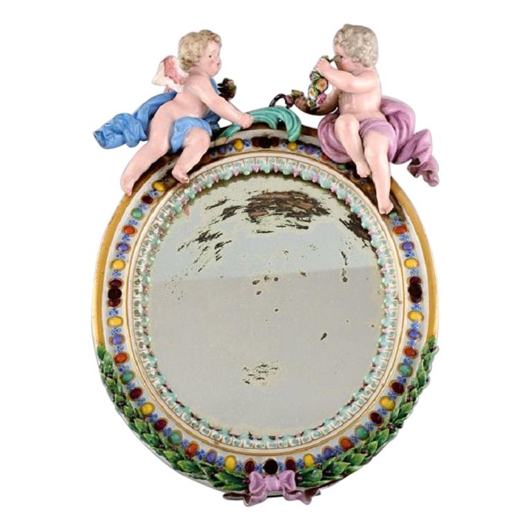 Antique Meissen Porcelain Mirror with Original Glass, Decorated with Putti For Sale