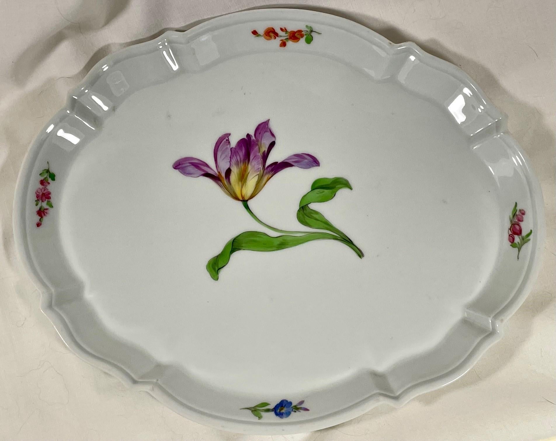 Antique Meissen Porcelain Neu Brandenstein oval serving dish.

This white porcelain serving dish by Meissen is circa 1900. It features a tasteful hand painted floral design (Neu Brandenstein pattern) and a decorative shaped rim. It is clearly