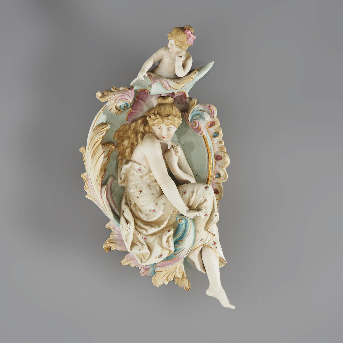 Antique German Porcelain Figural Plaques in the Manner of Meissen with Courting Couple, Cherubs and Foliate Elements C1920

Measures- 12.5''H x 7.75''W x 2.5''D