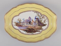 Antique Meissen tray made of porcelain, with a motif of birds in a park.