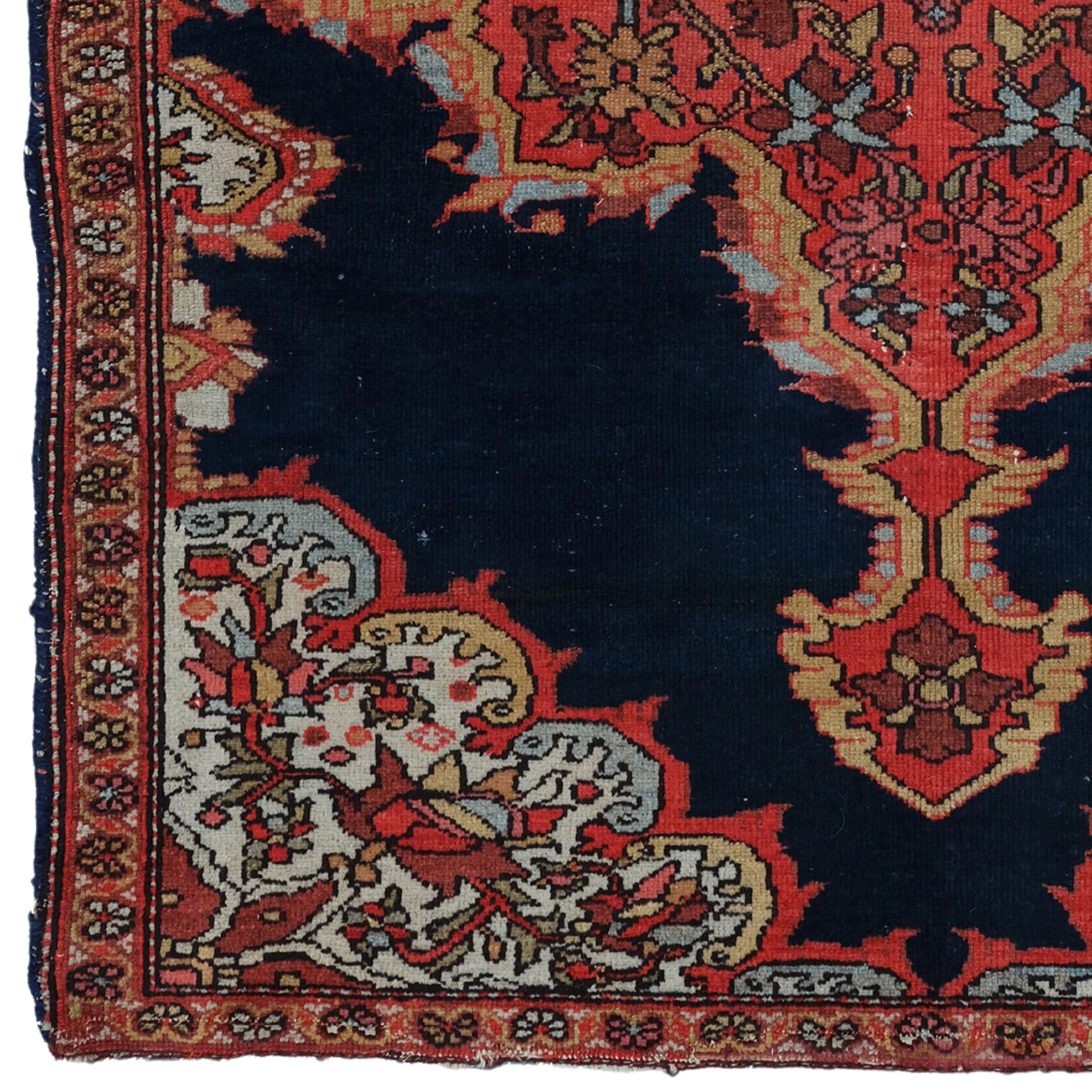 This elegant 19th-century Melayer carpet is an example of the most exquisite handcraftsmanship of its period. It adds nobility to any space with its rich history and sophisticated design. Vibrant red and golden motifs embroidered on a dark blue