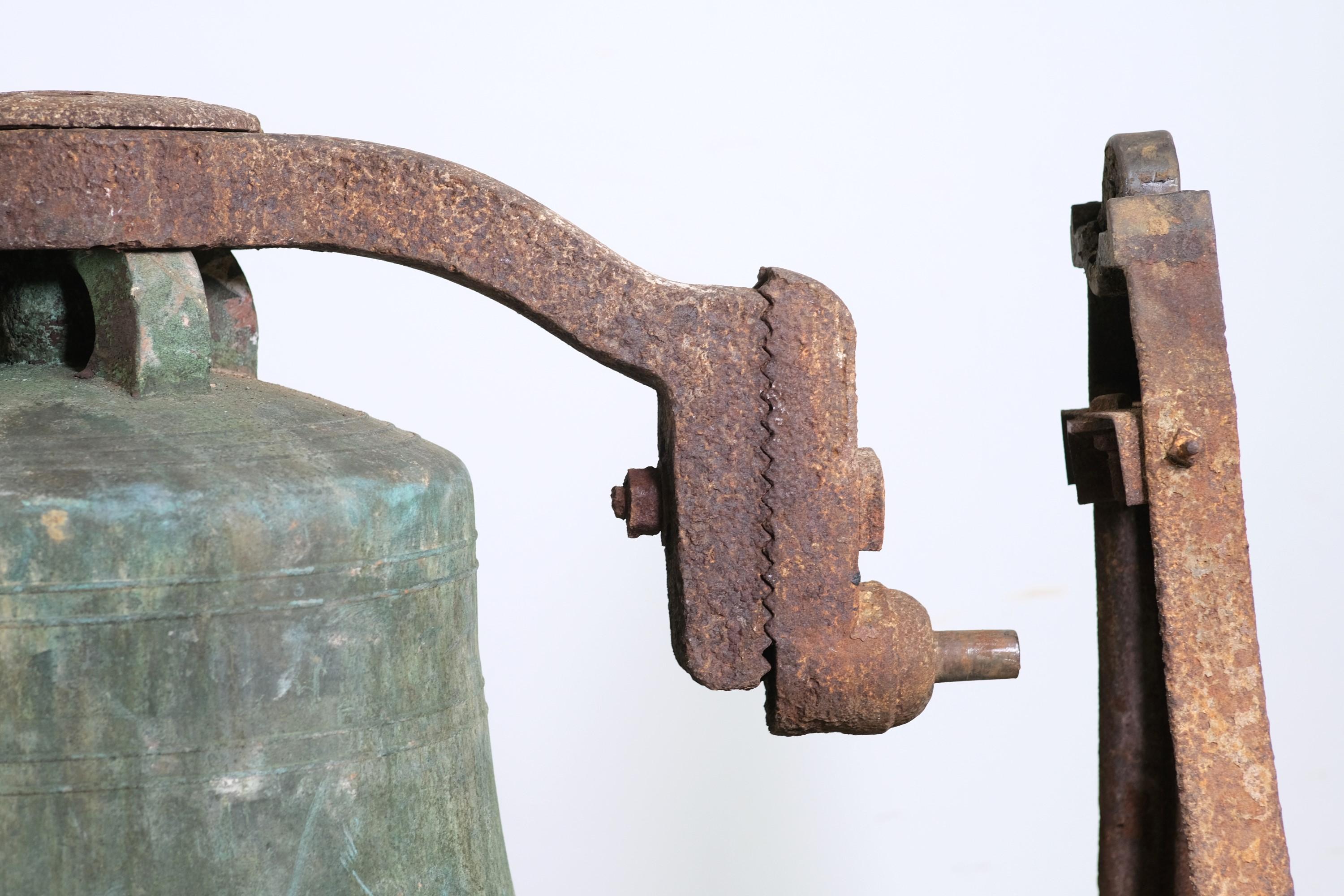 Solid bronze verdigris patina mid 1800s church bell with a cast iron bracket and base. This is in good condition with no cracks except in the iron bracket. This is stamped Meneely's West Troy N.Y 1855. Please note, this item is located in our