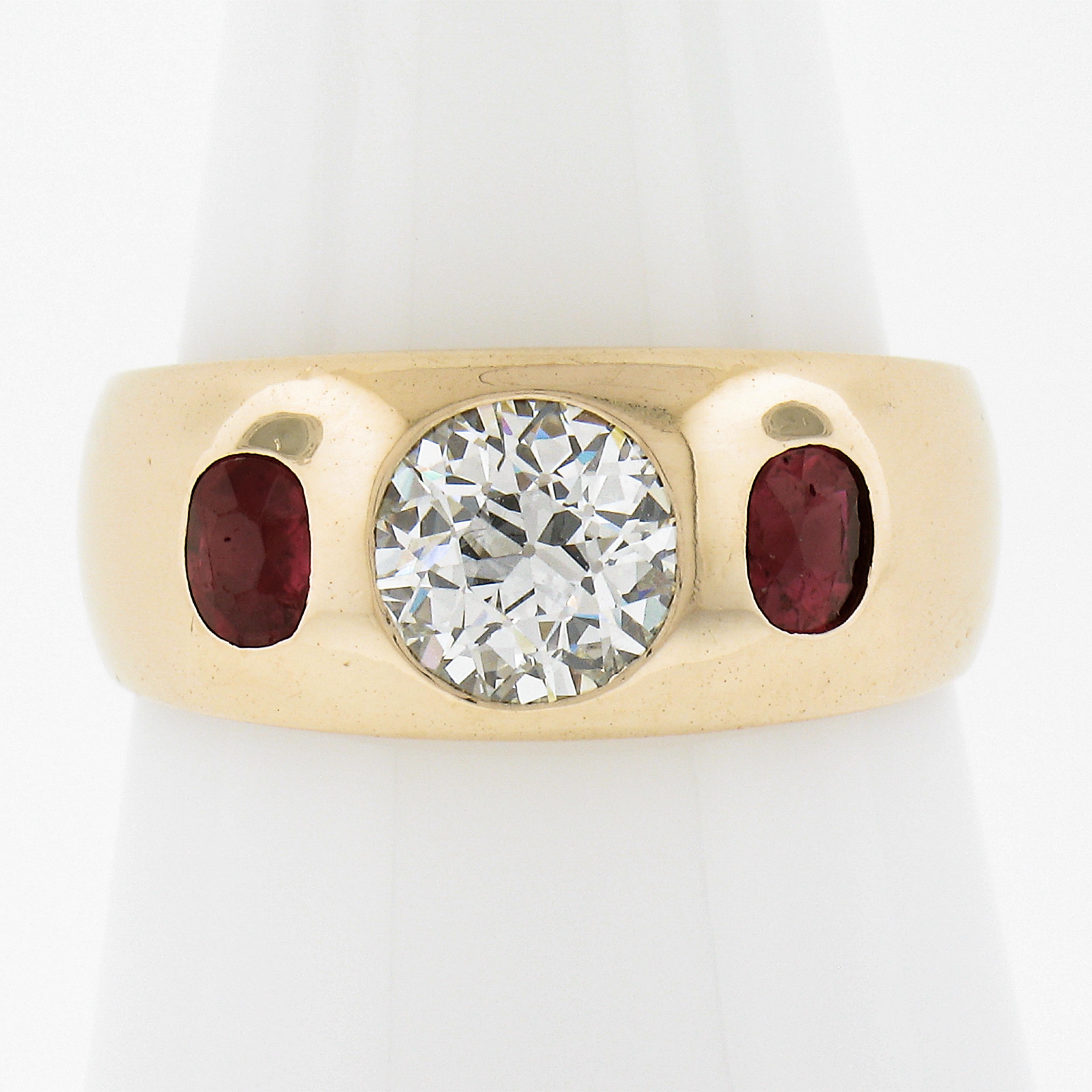 Here we have an all original ring with a super fiery old European cut diamond center flush burnish set with old oval cut rubies on either side. This ring remains in excellent condition and is truly a must see! Enjoy! 

--Stone(s):--
(1) Natural