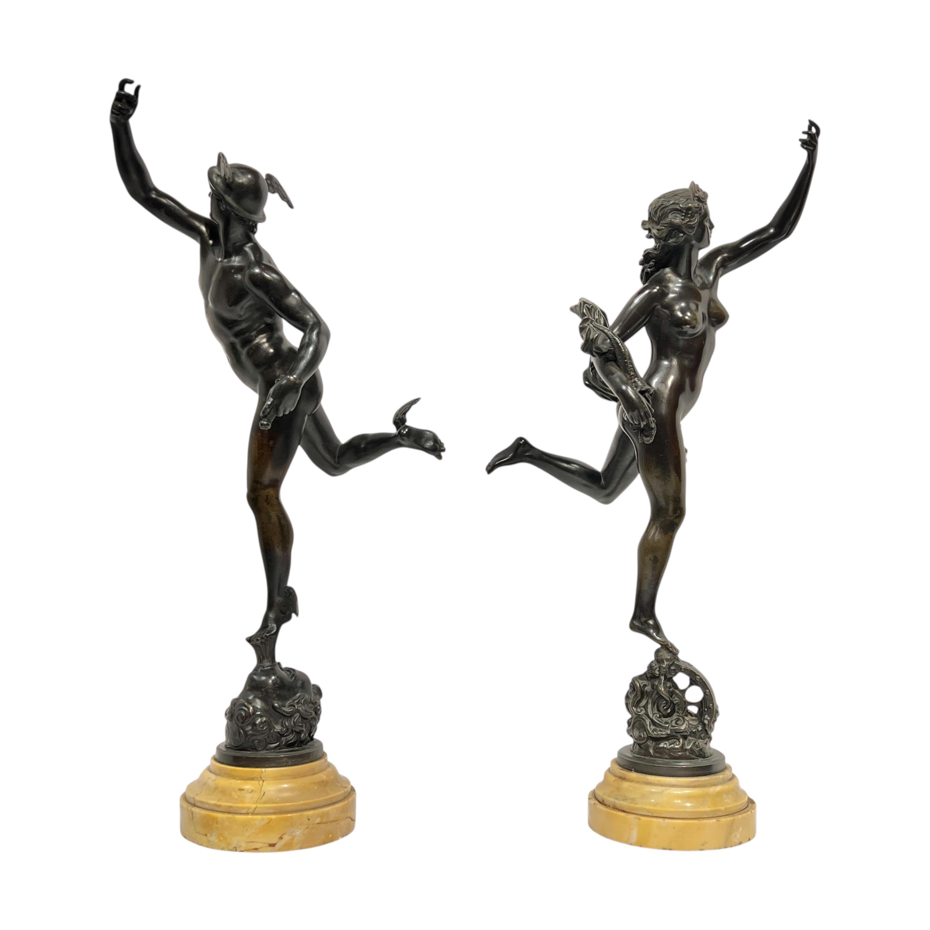 Antique late 19th  century patinated bronze sculptures of Mercury and Fortuna after the original models by Giambologna (1529-1608), aka Giovanni da Bologna (Italian) and Jean de Bologne (French), measuring 19 1/2 inches tall and mounted on round