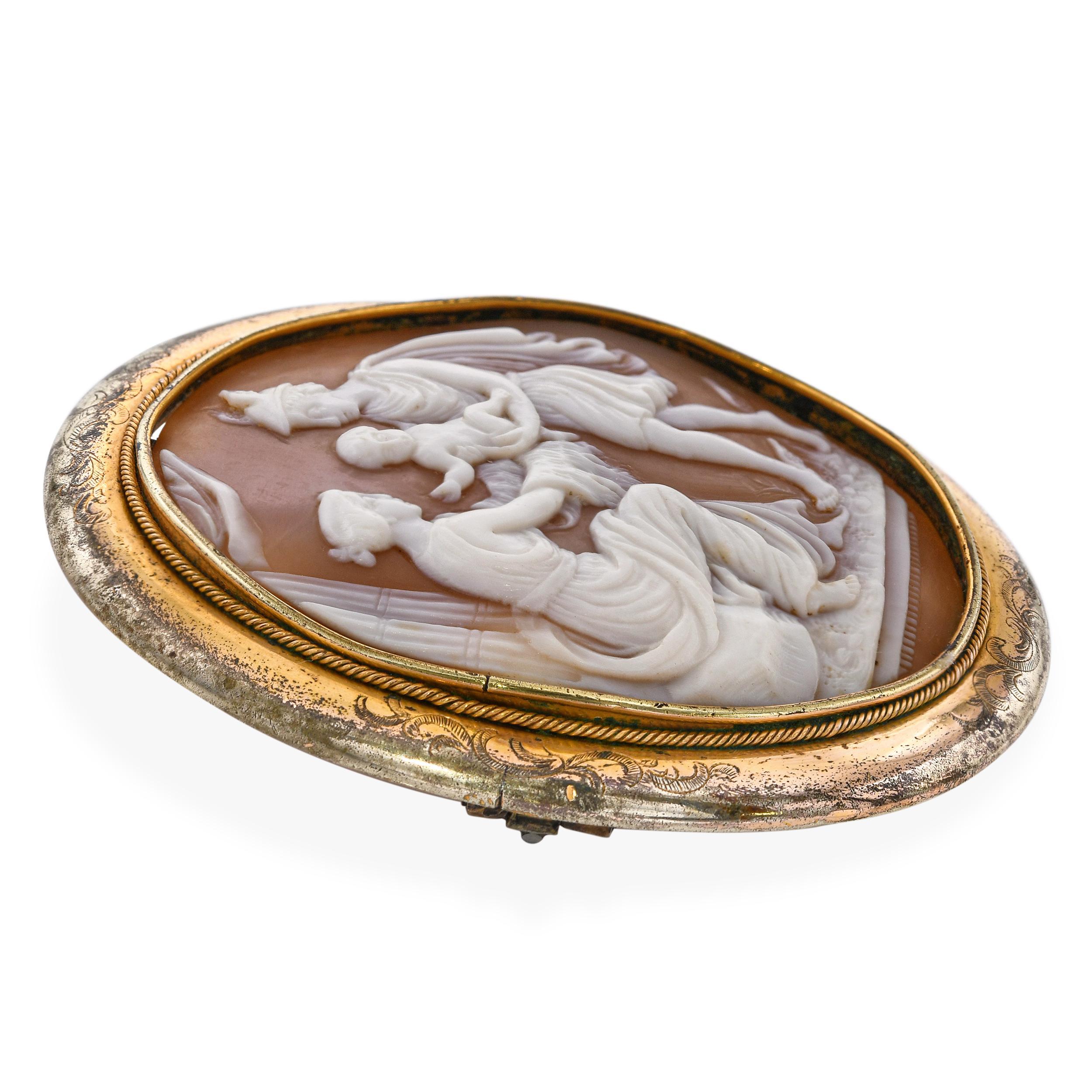 Women's Antique Mercury Presenting an Infant Shell Cameo Brooch For Sale
