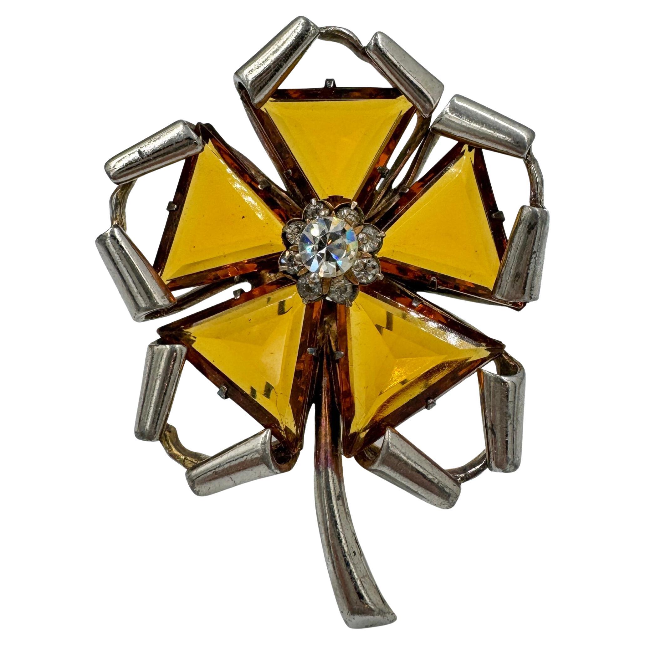 Antique metal and glass flower fur brooch